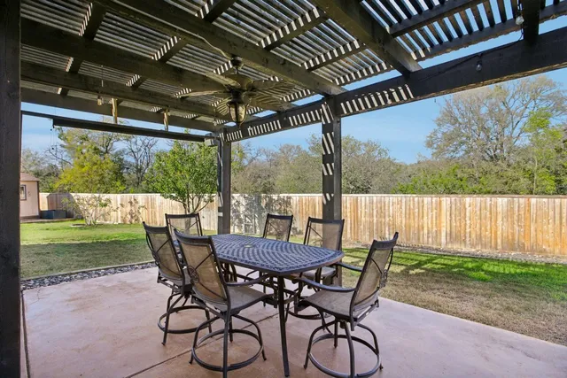 a view of an outdoor space with furniture