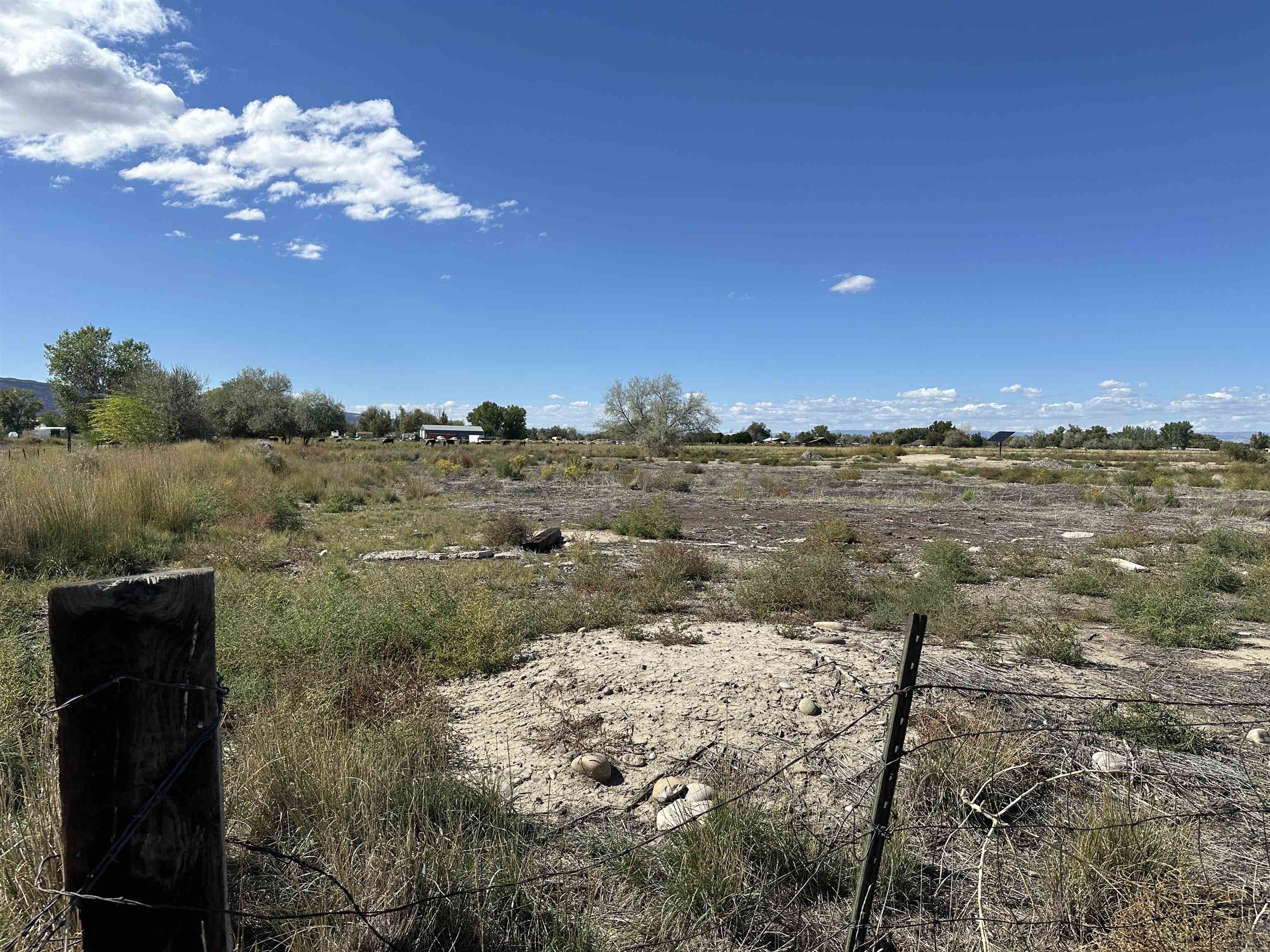 2120 East 1/2 Road Grand Junction, CO 81505 - Photo 7 of 9 a view of a lake with a mountain