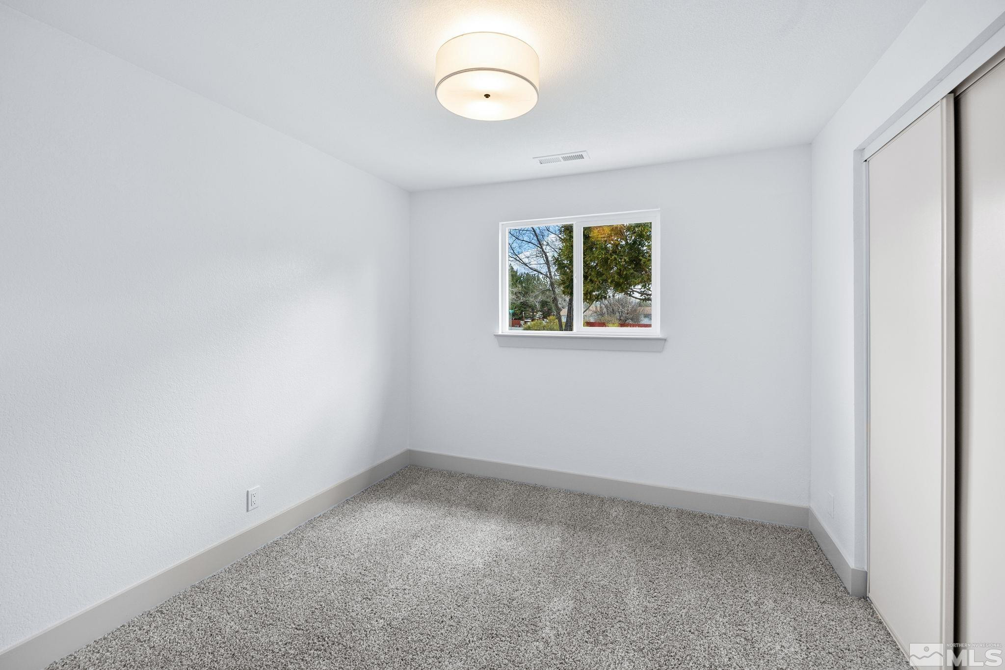 3575 Gull Street Reno, NV 89508 - Photo 21 of 32 an empty room with a window