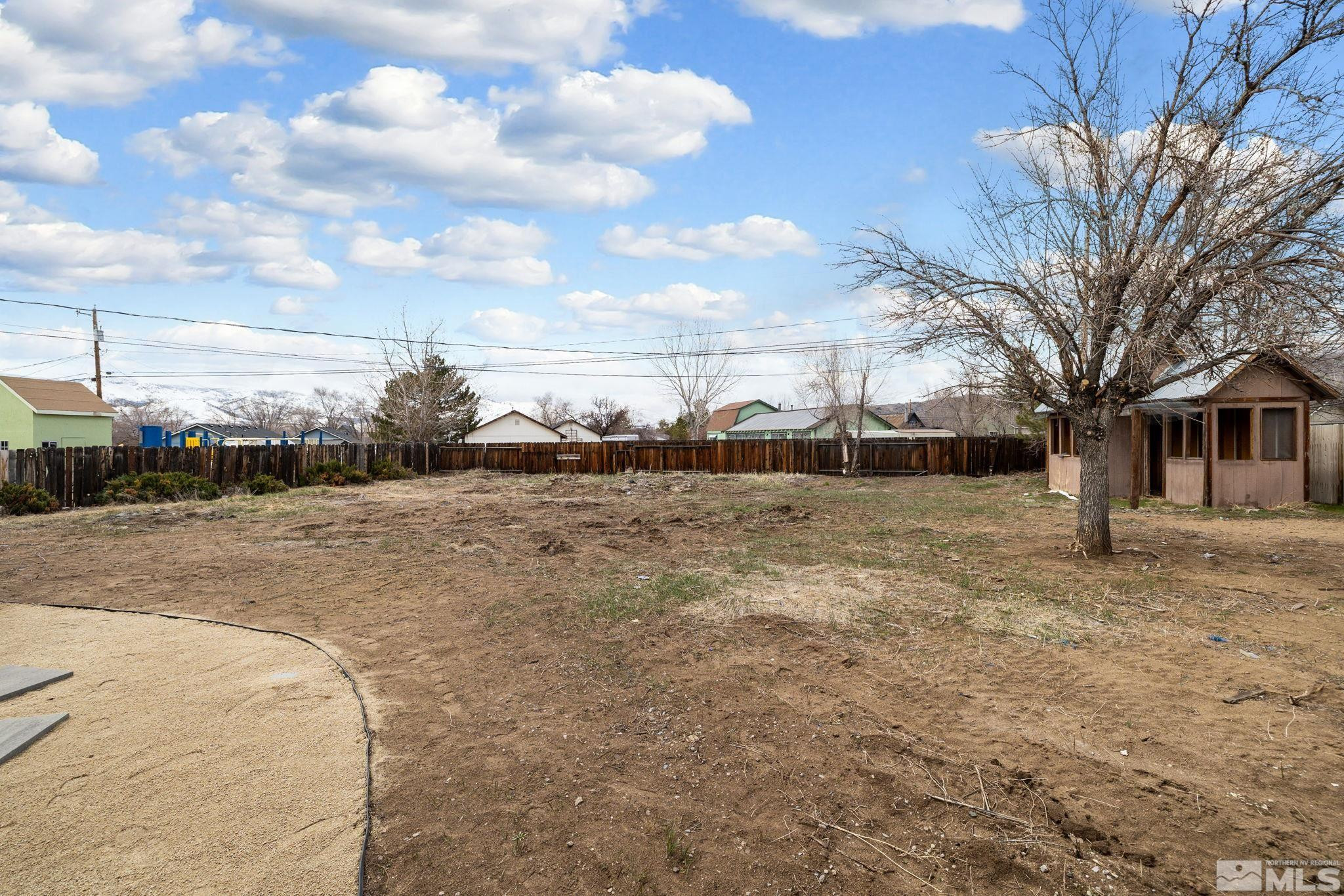 3575 Gull Street Reno, NV 89508 - Photo 27 of 32 a view of a dry yard with wooden fence