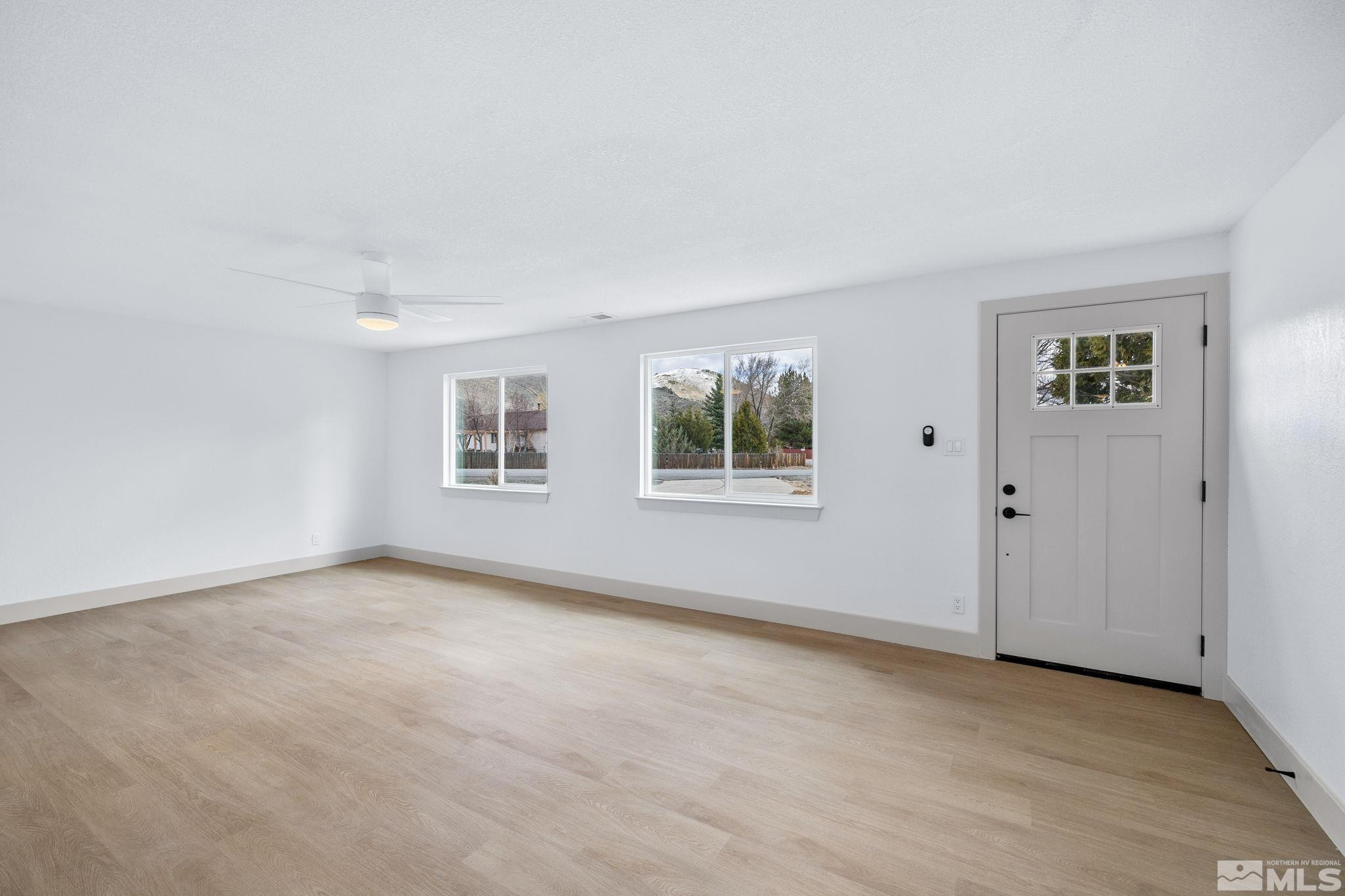 3575 Gull Street Reno, NV 89508 - Photo 3 of 32 an empty room with windows