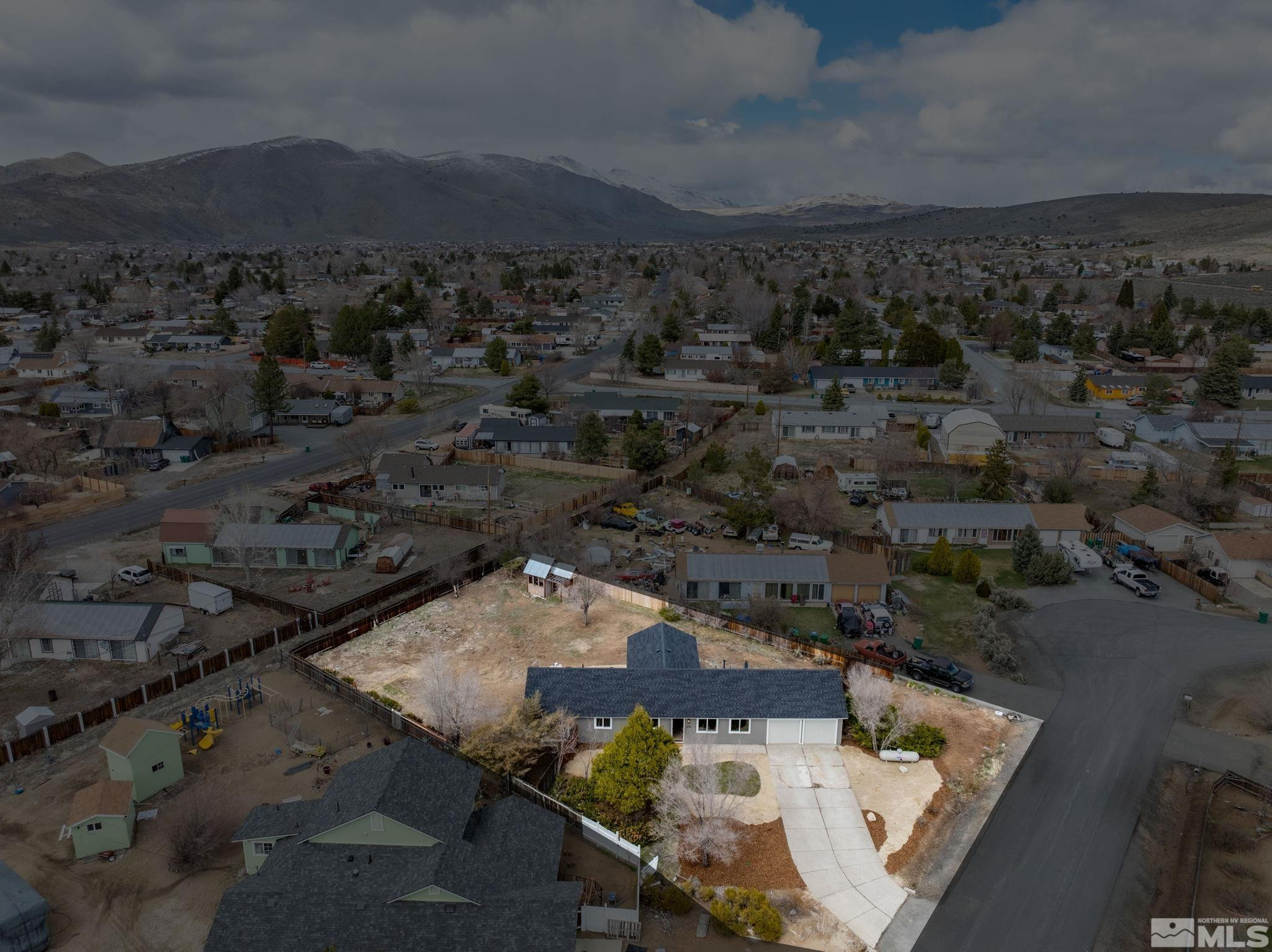 3575 Gull Street Reno, NV 89508 - Photo 31 of 32 an aerial view of a house with a mountain