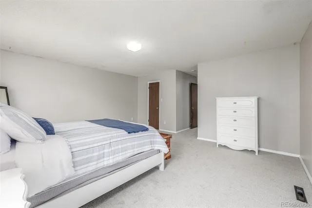 a bed room with a bed and a view