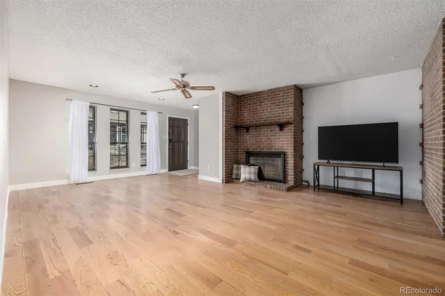 a view of livingroom with furniture and a flat screen tv
