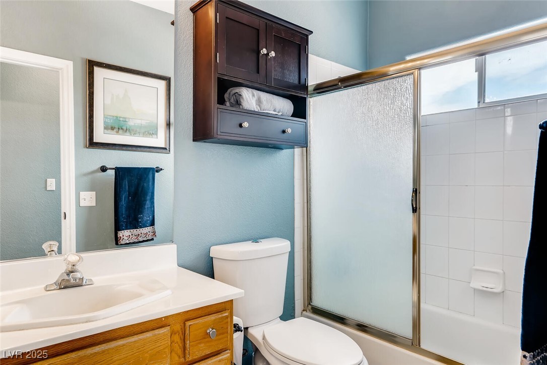7237 West Mesa Vista Avenue Las Vegas, NV 89113 - Photo 24 of 26 Full bath with vanity, combined bath / shower with