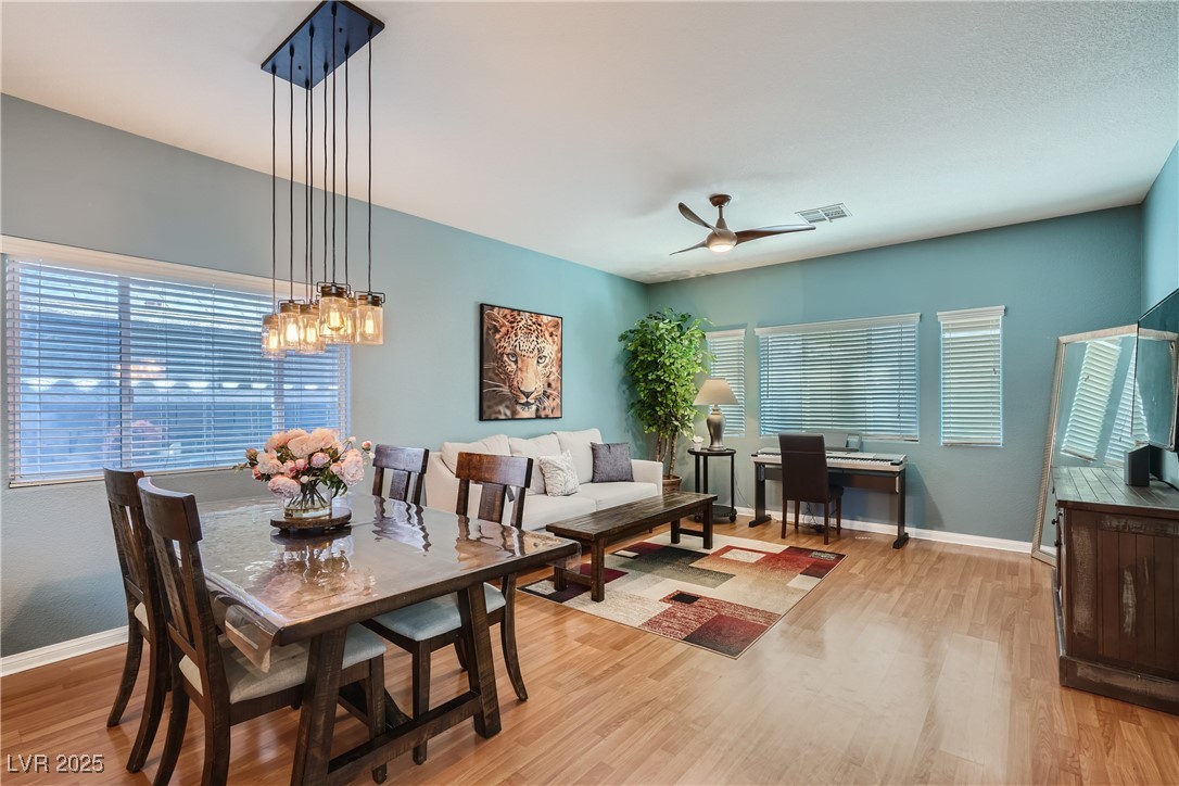 7237 West Mesa Vista Avenue Las Vegas, NV 89113 - Photo 6 of 26 Dining room with light wood finished floors, ceili