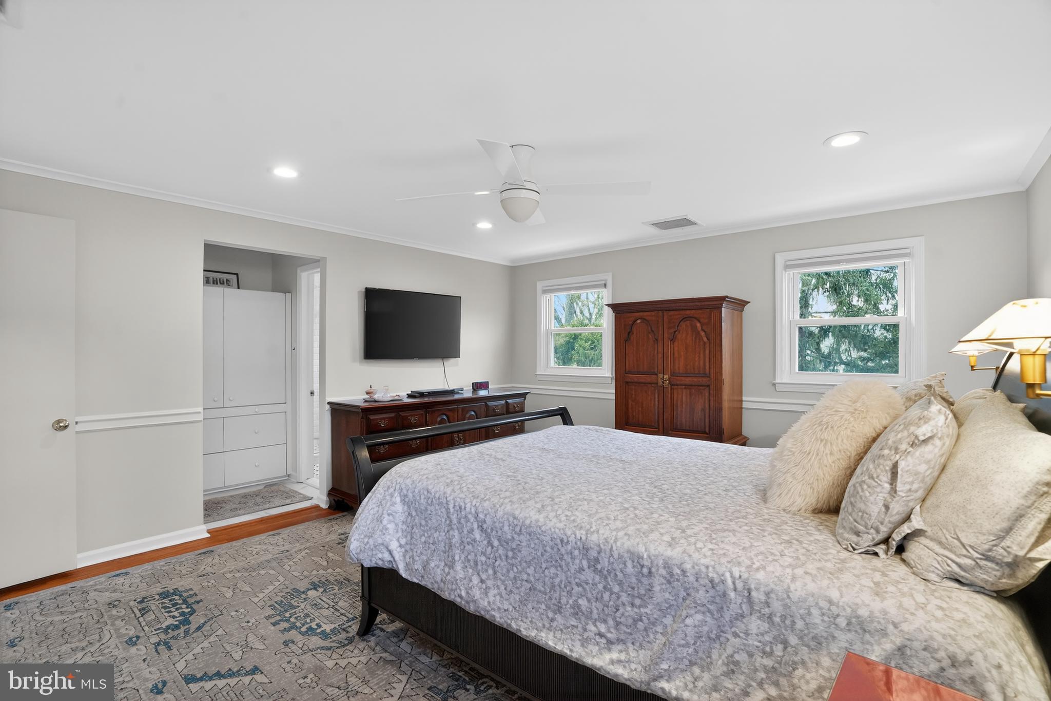 211 Fairfield Drive Wallingford, PA 19086 - Photo 13 of 29 a bedroom with a bed and a flat screen tv