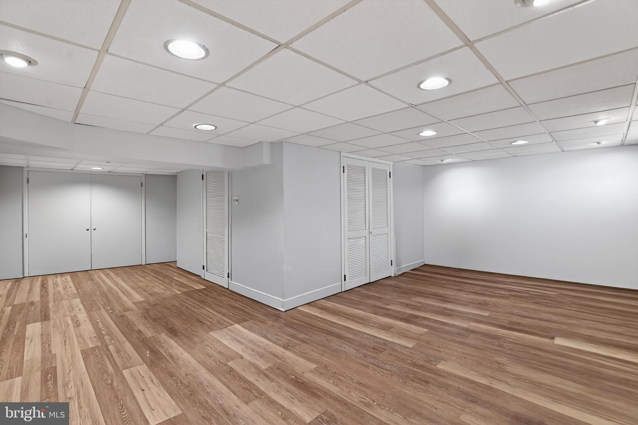 211 Fairfield Drive Wallingford, PA 19086 - Photo 20 of 29 a view of an empty room with wooden floor