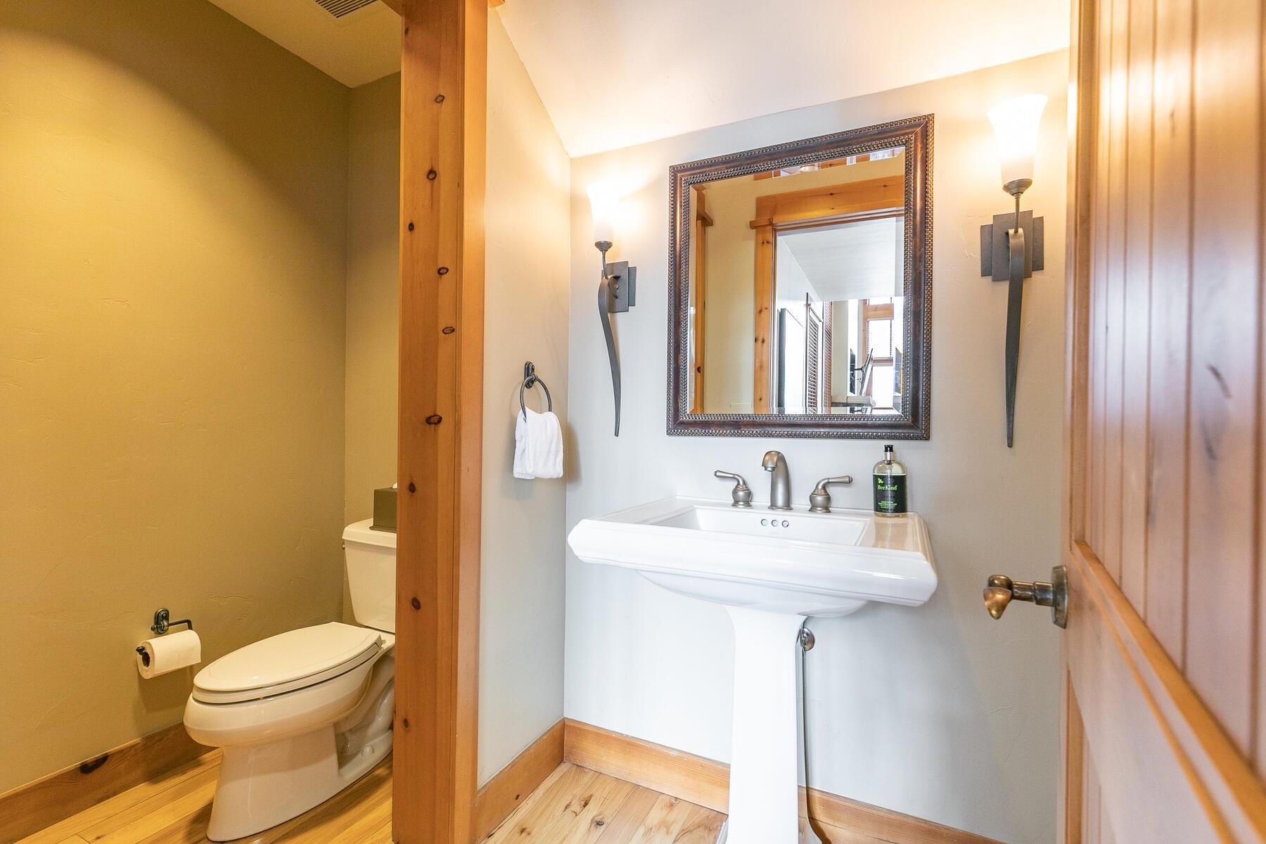 12220 Lookout Loop, Unit F2132 Truckee, CA 96161 - Photo 12 of 20 a bathroom with a toilet sink and mirror