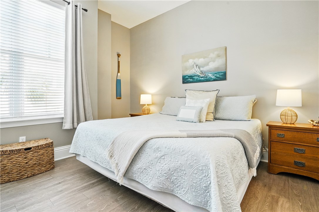 20 Waterfront Drive, Unit 121 St. Simons Island, GA 31522 - Photo 20 of 42 Guest bedroom overlooks the marina pool.