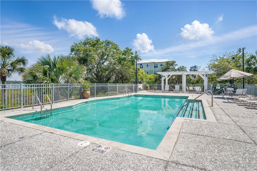 20 Waterfront Drive, Unit 121 St. Simons Island, GA 31522 - Photo 33 of 42 The inviting waters of the community pool offer the inviting waters of rest and relaxation--complete with stunning views of the marina, intracoastal, and ever changing skies. The best of both worlds!!