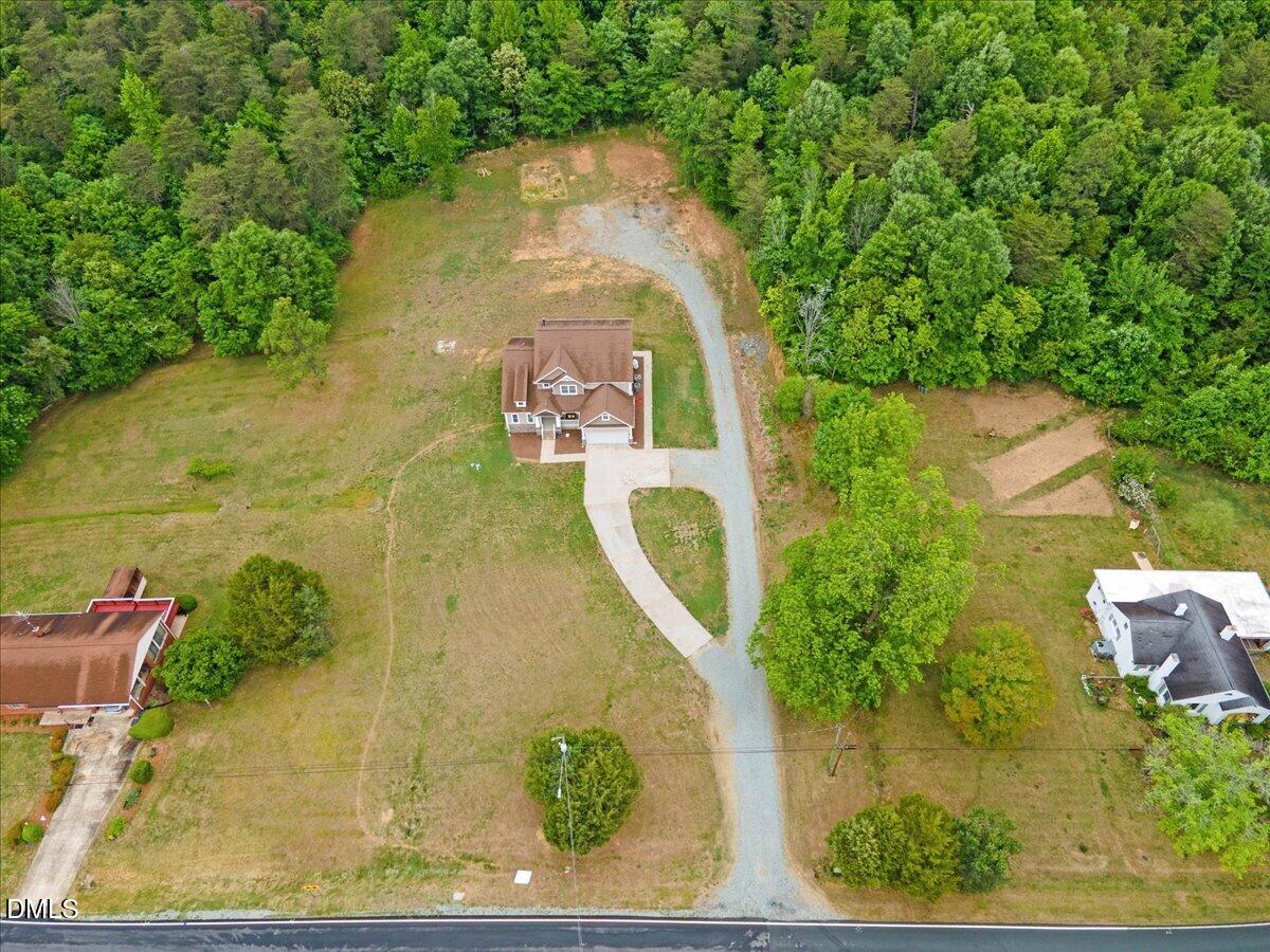 704 Haw River Hopedale Road Burlington, NC 27217 - Photo 40 of 49 an aerial view of a house with a yard basket ball court