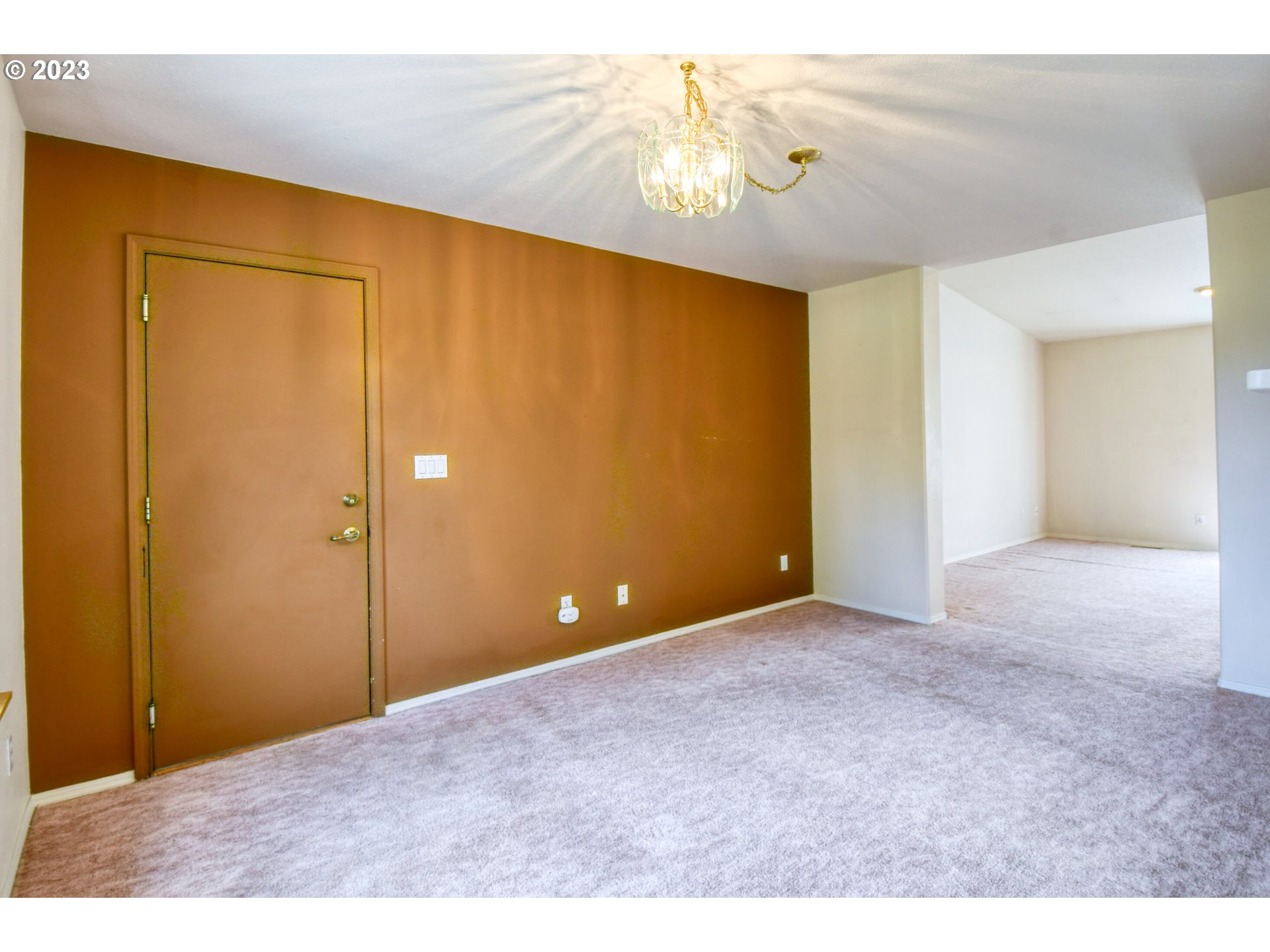 3775 Southwest Marshall Place Pendleton, OR 97801 - Photo 8 of 45 a view of an empty room with a chandelier fan