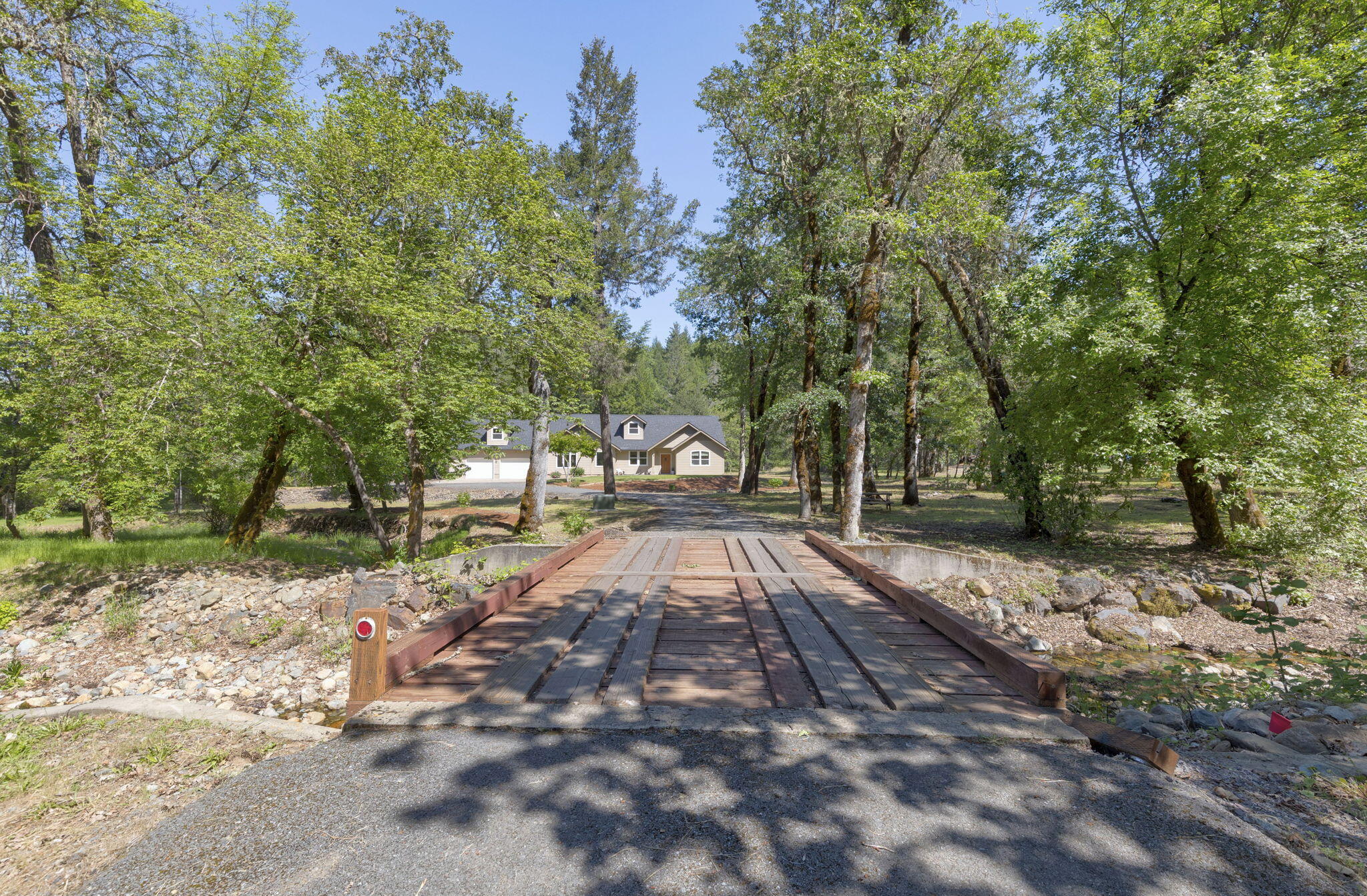 45 Marble Mountain Road Grants Pass, OR 97527 - Photo 24 of 40 Bridge over creek to property.