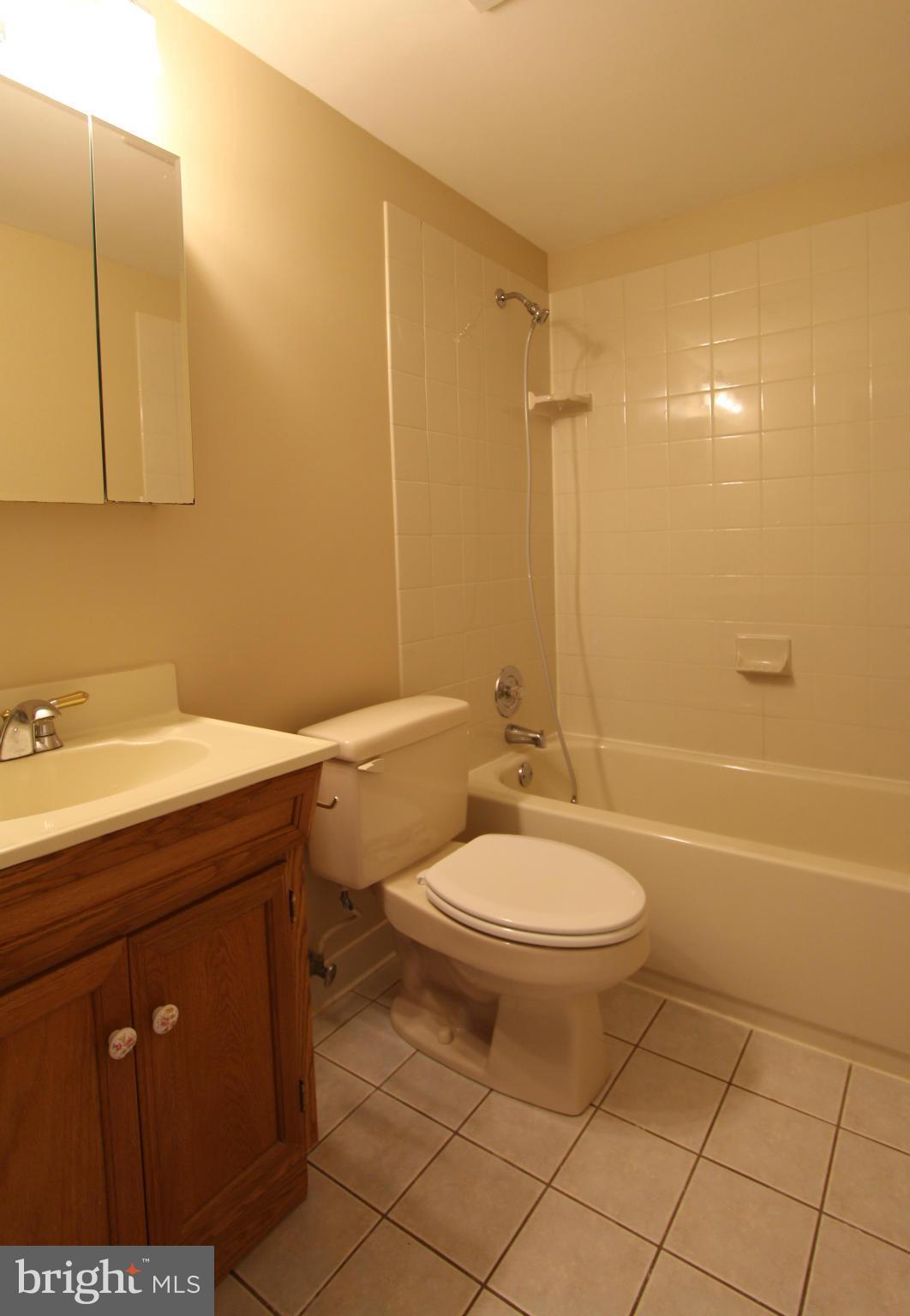 4900 Kaye Road Woodbridge, VA 22193 - Photo 28 of 30 3rd full bathroom in basement w/ ceramic tile