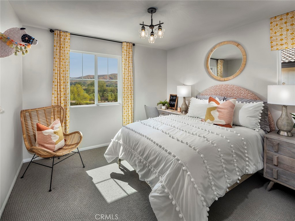 2049 Tangelo Lane Redlands, CA 92374 - Photo 11 of 15 a bedroom with a bed and a window