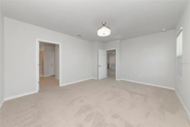 an empty room with a natural light