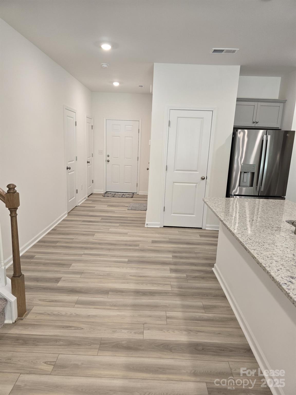 3519 Secrest Landing Monroe, NC 28110 - Photo 4 of 25 a view of a kitchen from the hallway