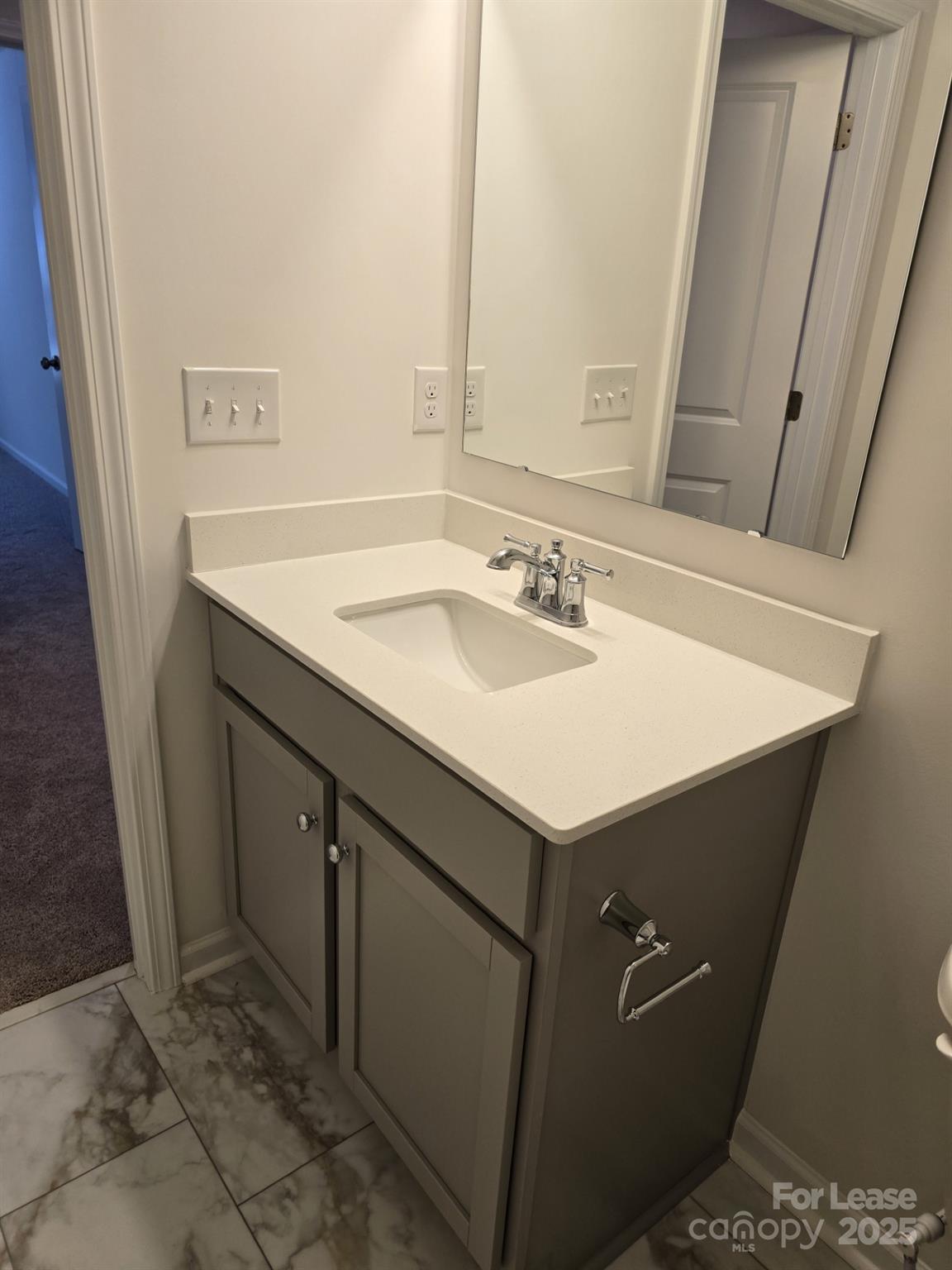 3519 Secrest Landing Monroe, NC 28110 - Photo 10 of 25 a bathroom with a sink and a mirror