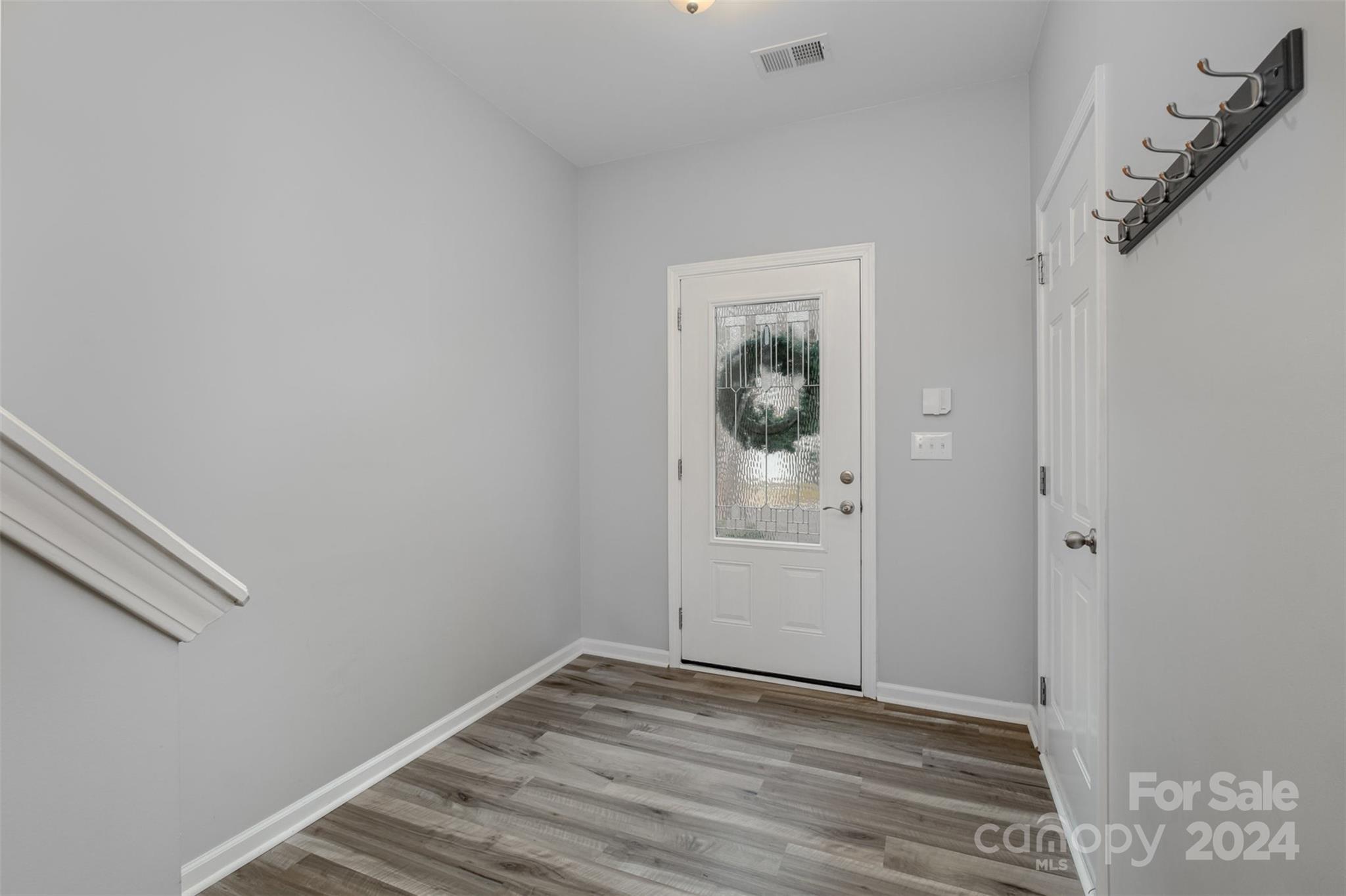 2111 Midnight Blue Lane Fort Mill, SC 29708 - Photo 3 of 27 a view of empty room with wooden floor