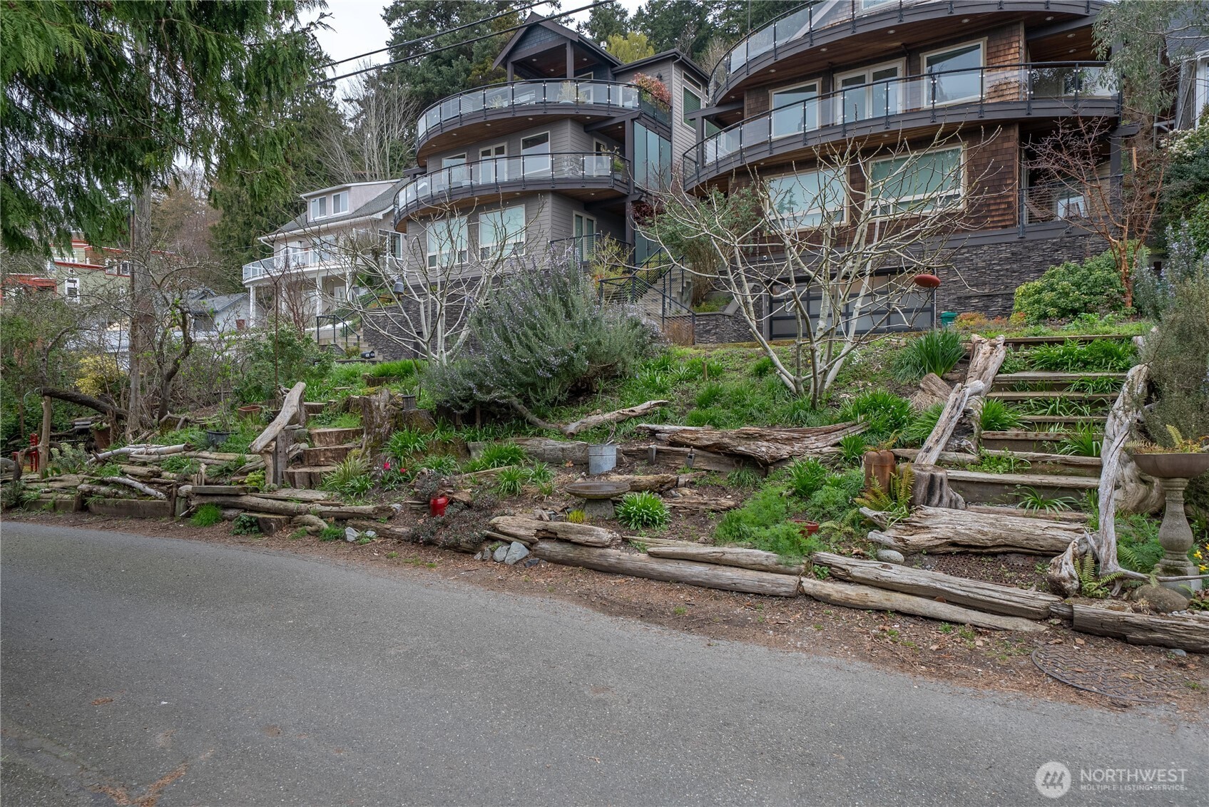 4226 Beach Drive Southwest, Unit 102 Seattle, WA 98116 - Photo 20 of 20 a view of a multi story building