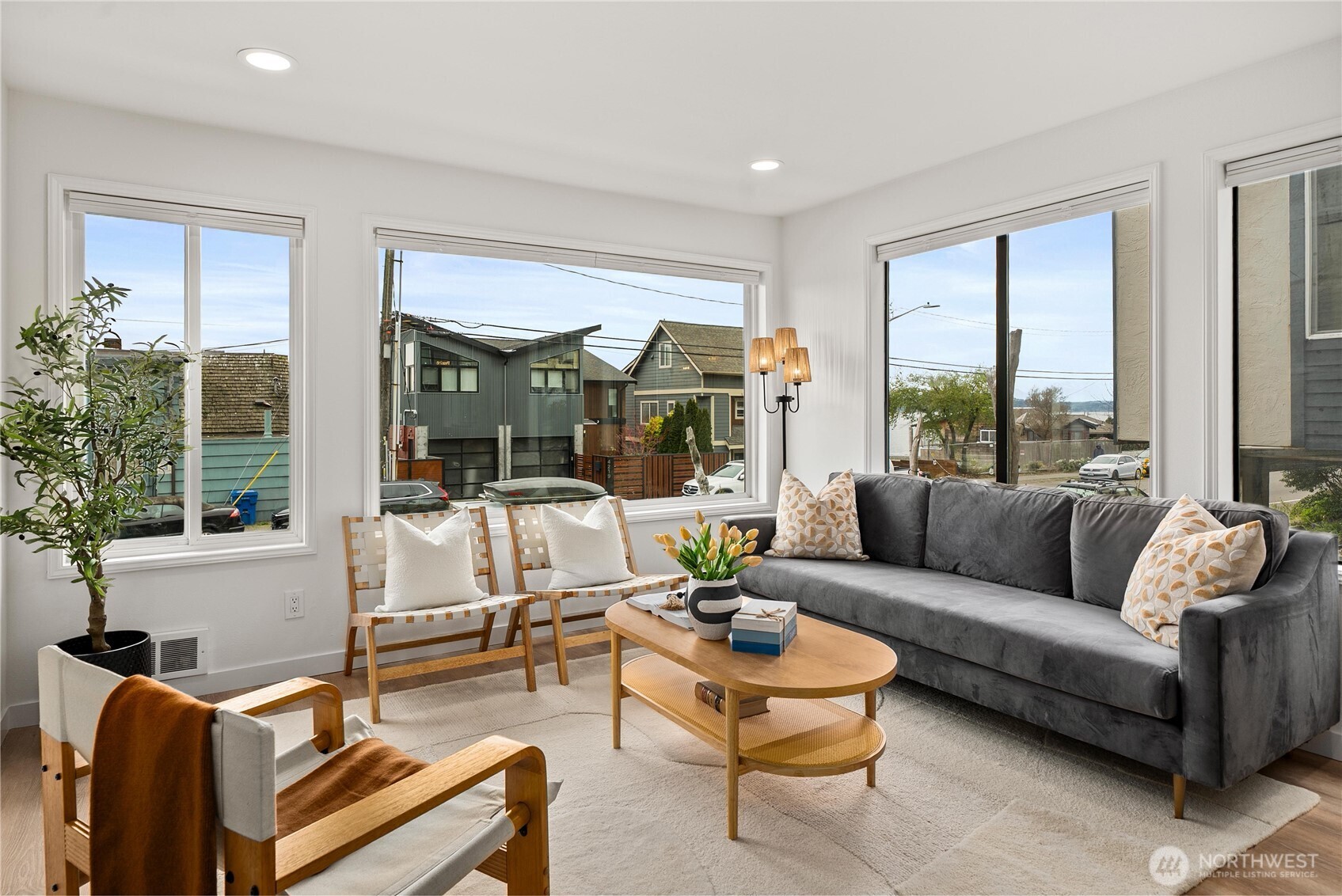 4226 Beach Drive Southwest, Unit 102 Seattle, WA 98116 - Photo 5 of 20 a living room with furniture and a large window