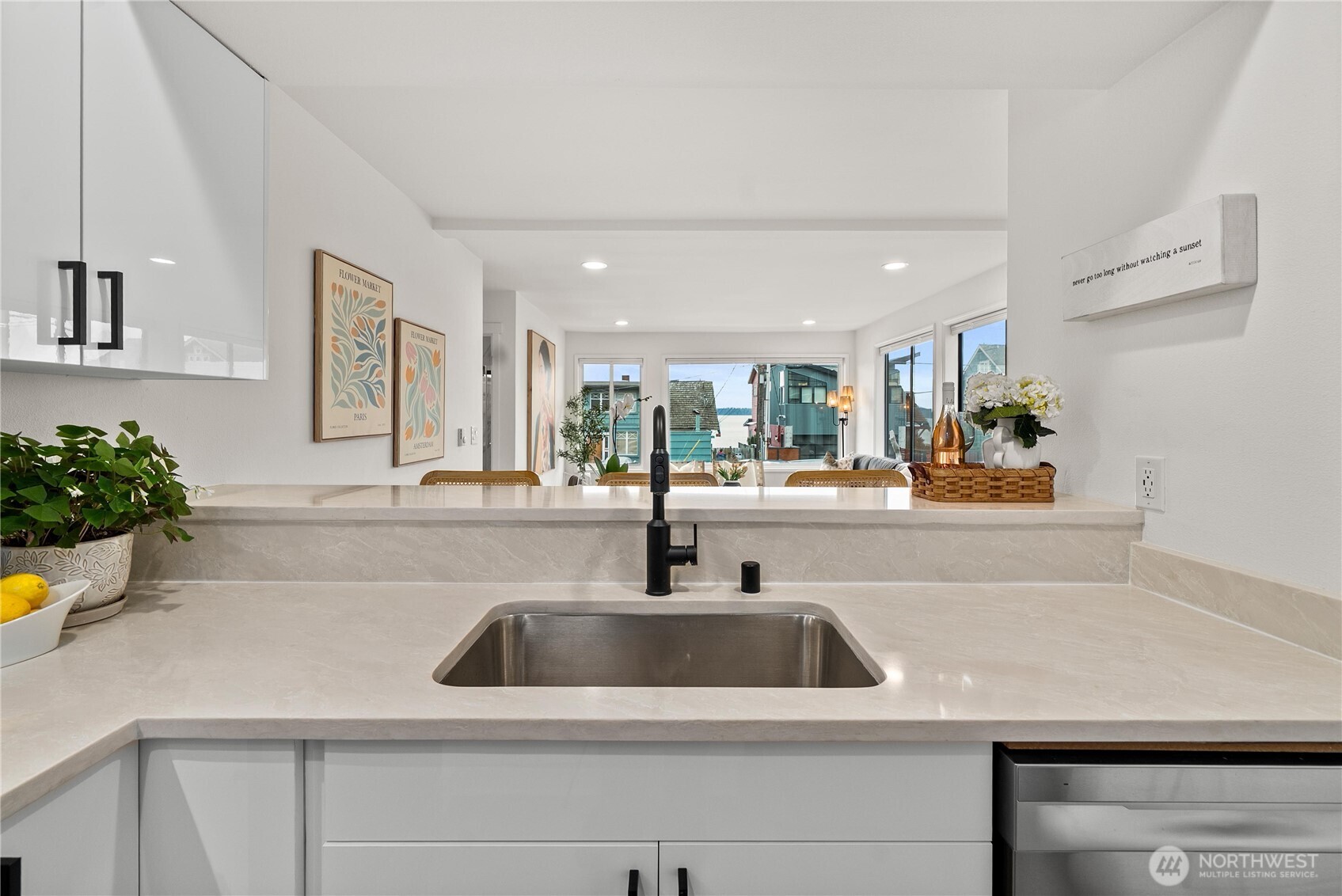 4226 Beach Drive Southwest, Unit 102 Seattle, WA 98116 - Photo 8 of 20 a bathroom with a sink and a mirror