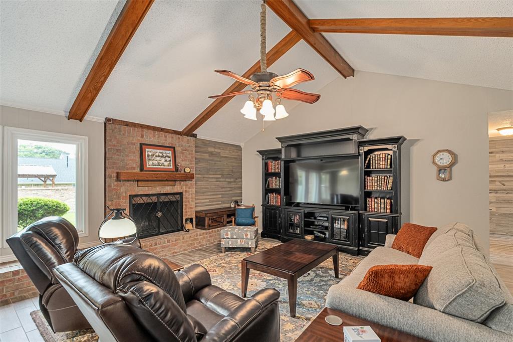 1102 Mill Run Road Athens, TX 75751 - Photo 7 of 35 a living room with furniture and a fireplace