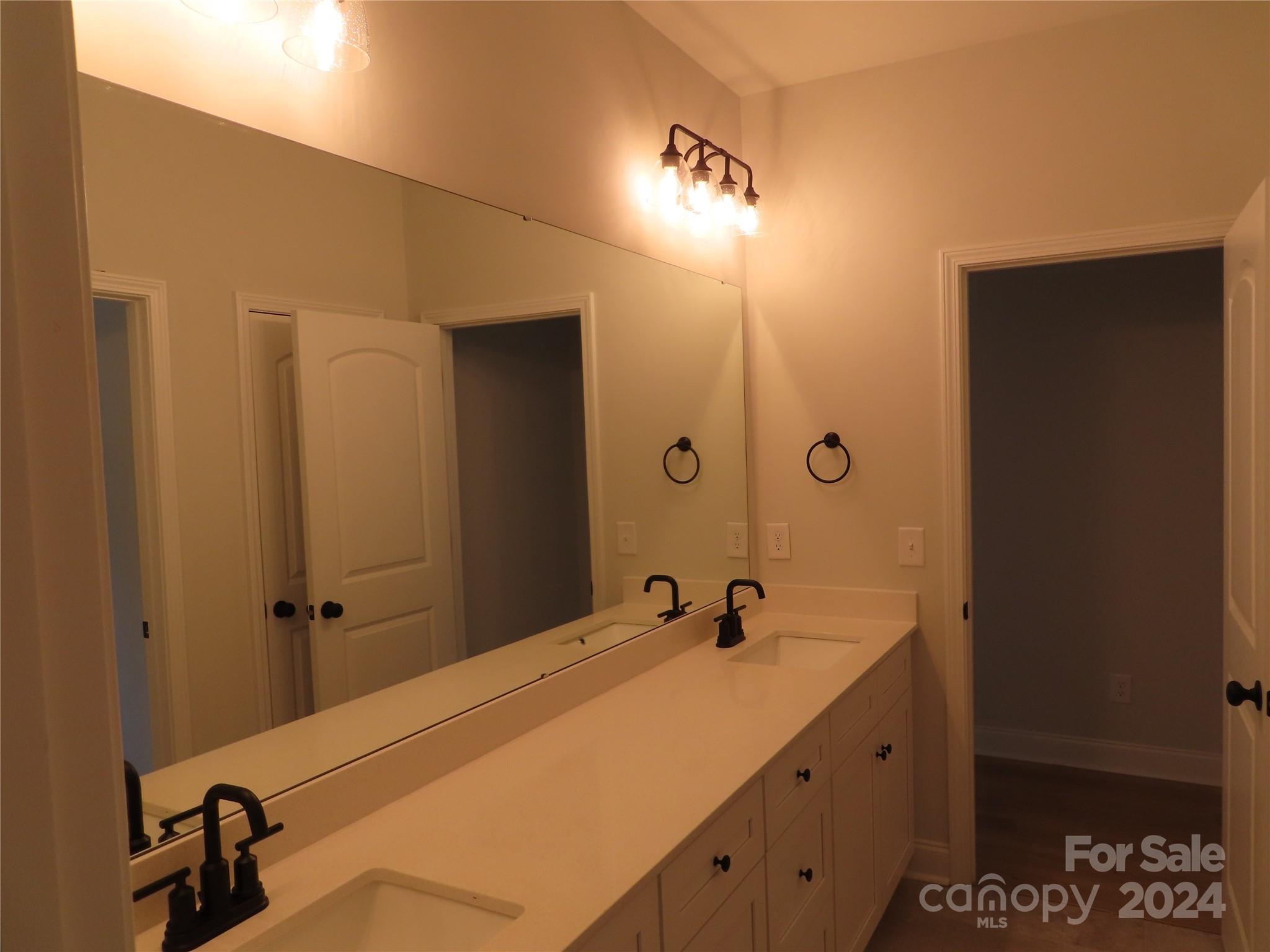 2225 Cedar Road, Unit 1 York, SC 29745 - Photo 15 of 31 a bathroom with a sink and mirror