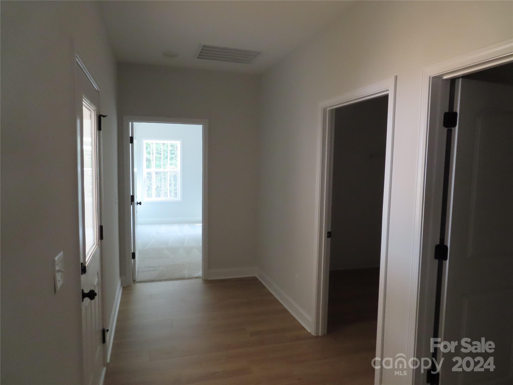 2225 Cedar Road, Unit 1 York, SC 29745 - Photo 18 of 31 a view of a hallway with wooden floor