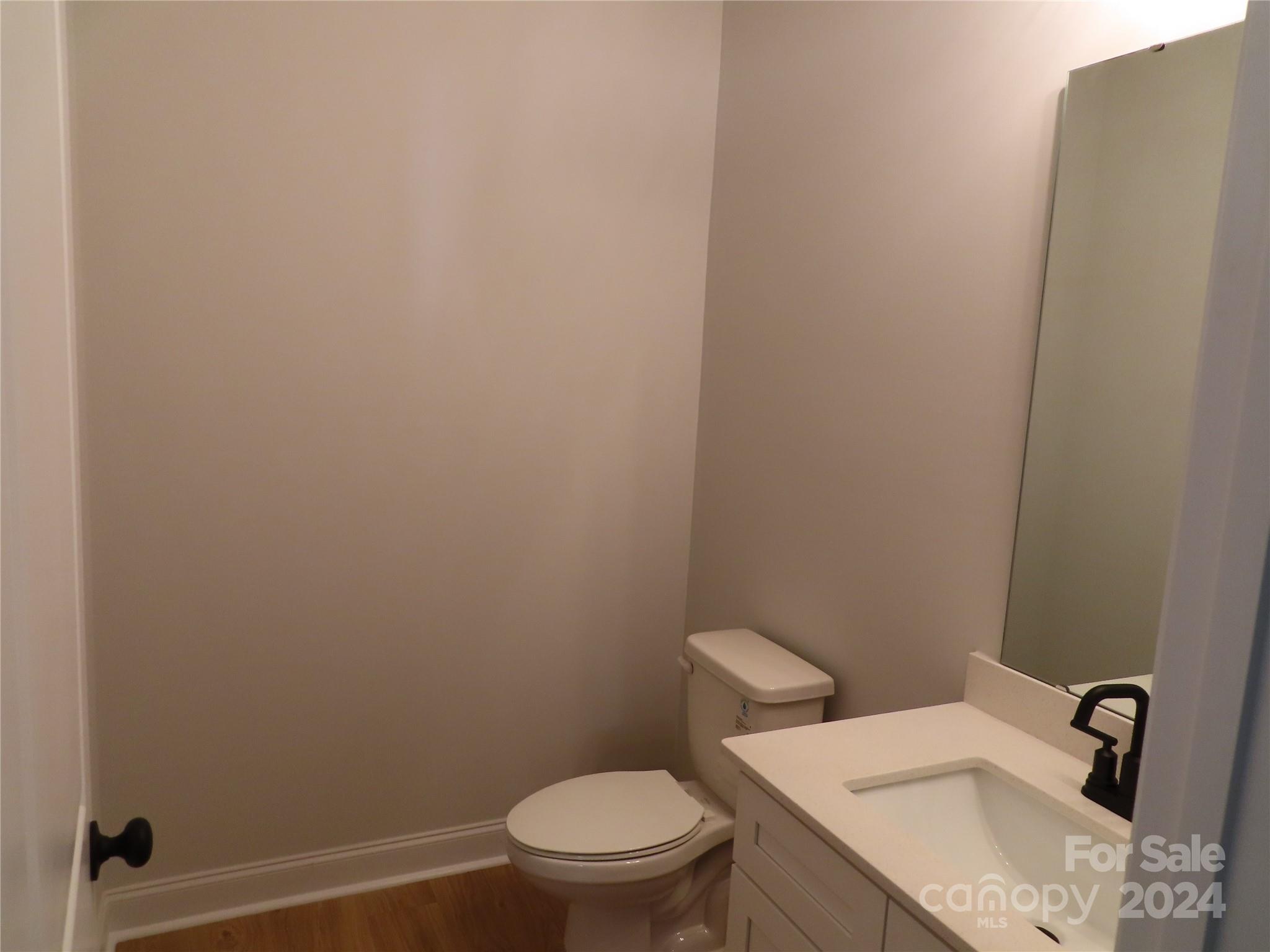 2225 Cedar Road, Unit 1 York, SC 29745 - Photo 25 of 31 a bathroom with a sink and a toilet