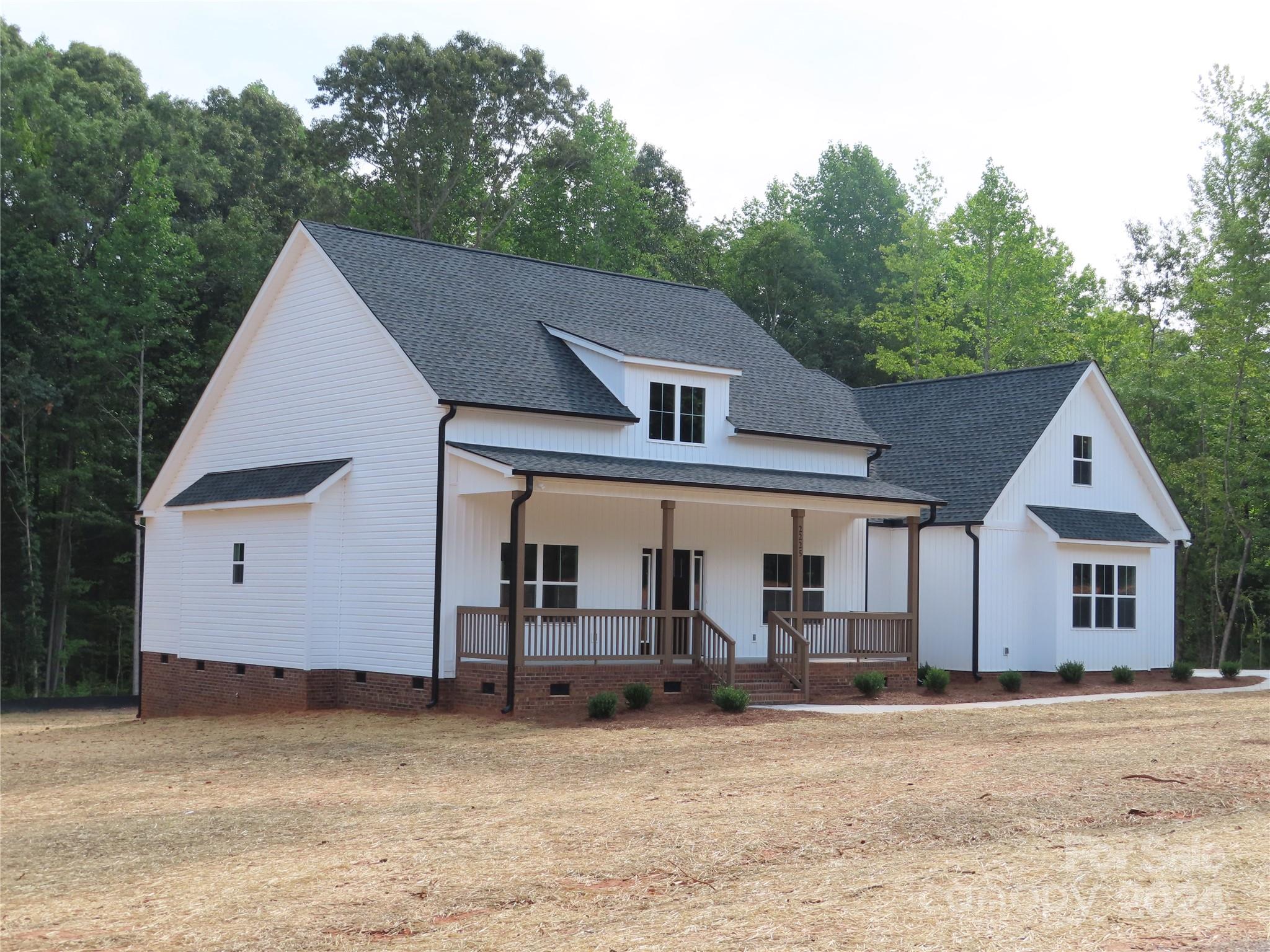 2225 Cedar Road, Unit 1 York, SC 29745 - Photo 3 of 31 a view of a house with a backyard and balcony