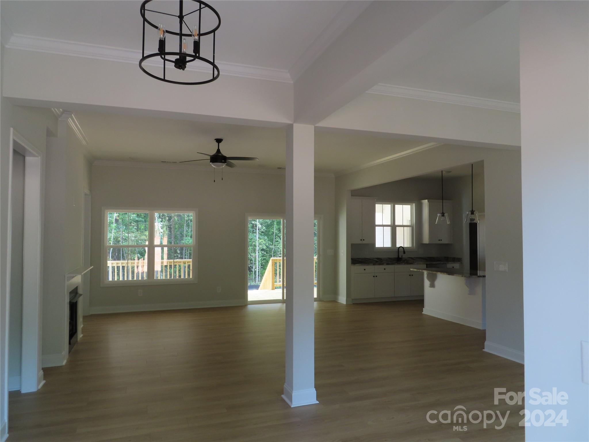 2225 Cedar Road, Unit 1 York, SC 29745 - Photo 6 of 31 a view of a hallway with wooden floor and windows