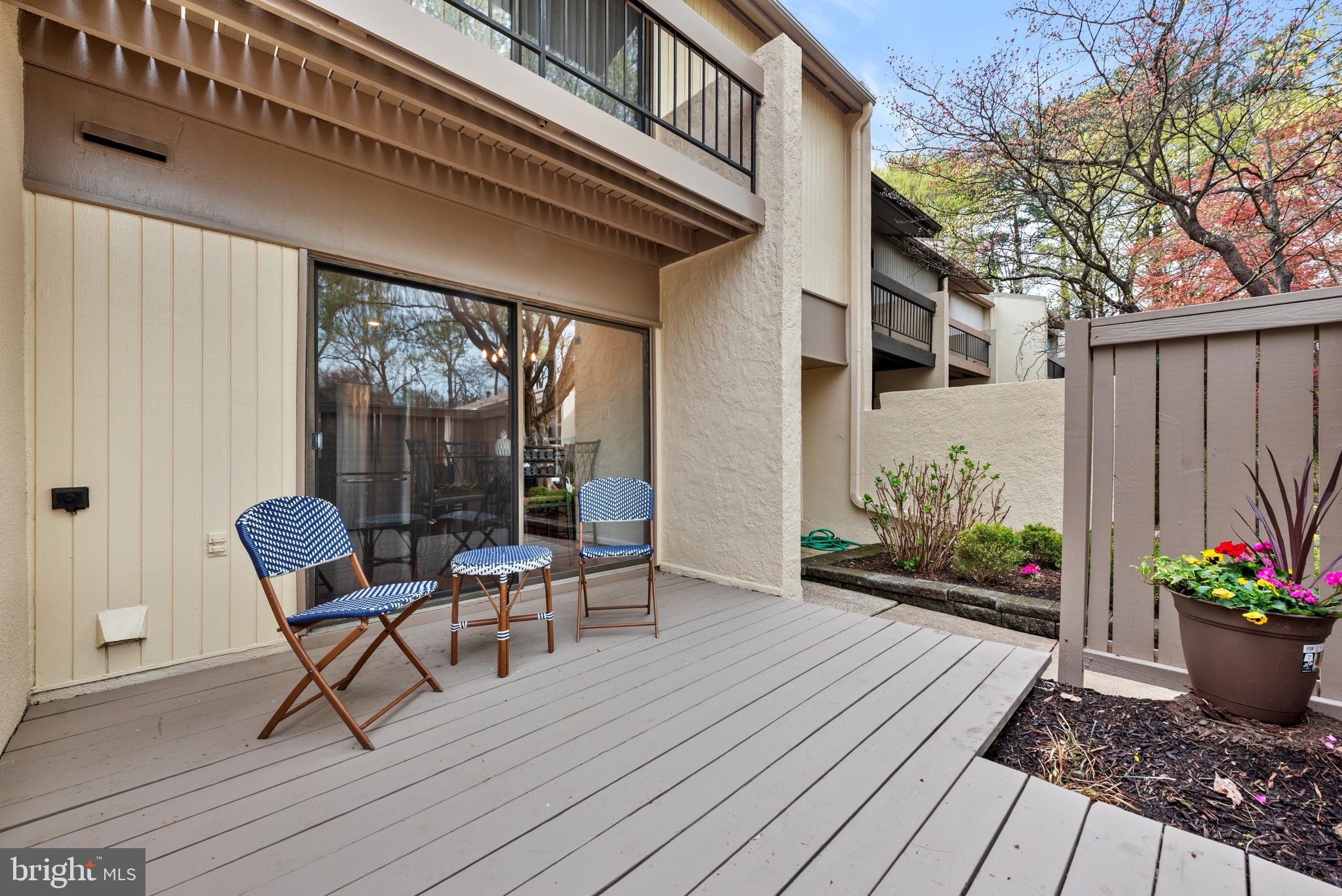 11711 Newbridge Court Reston, VA 20191 - Photo 3 of 37 a view of a two chairs and table in the balcony