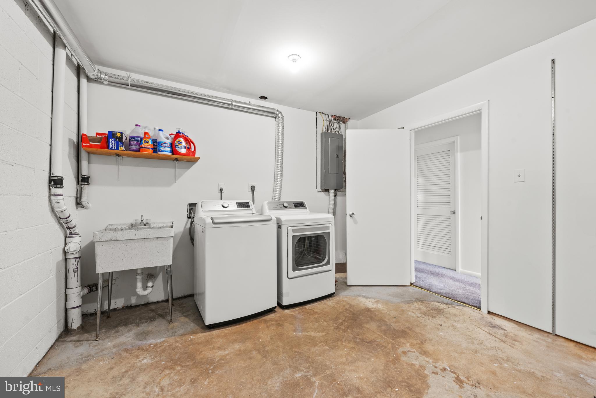 11711 Newbridge Court Reston, VA 20191 - Photo 31 of 37 a utility room with sink dryer and washer