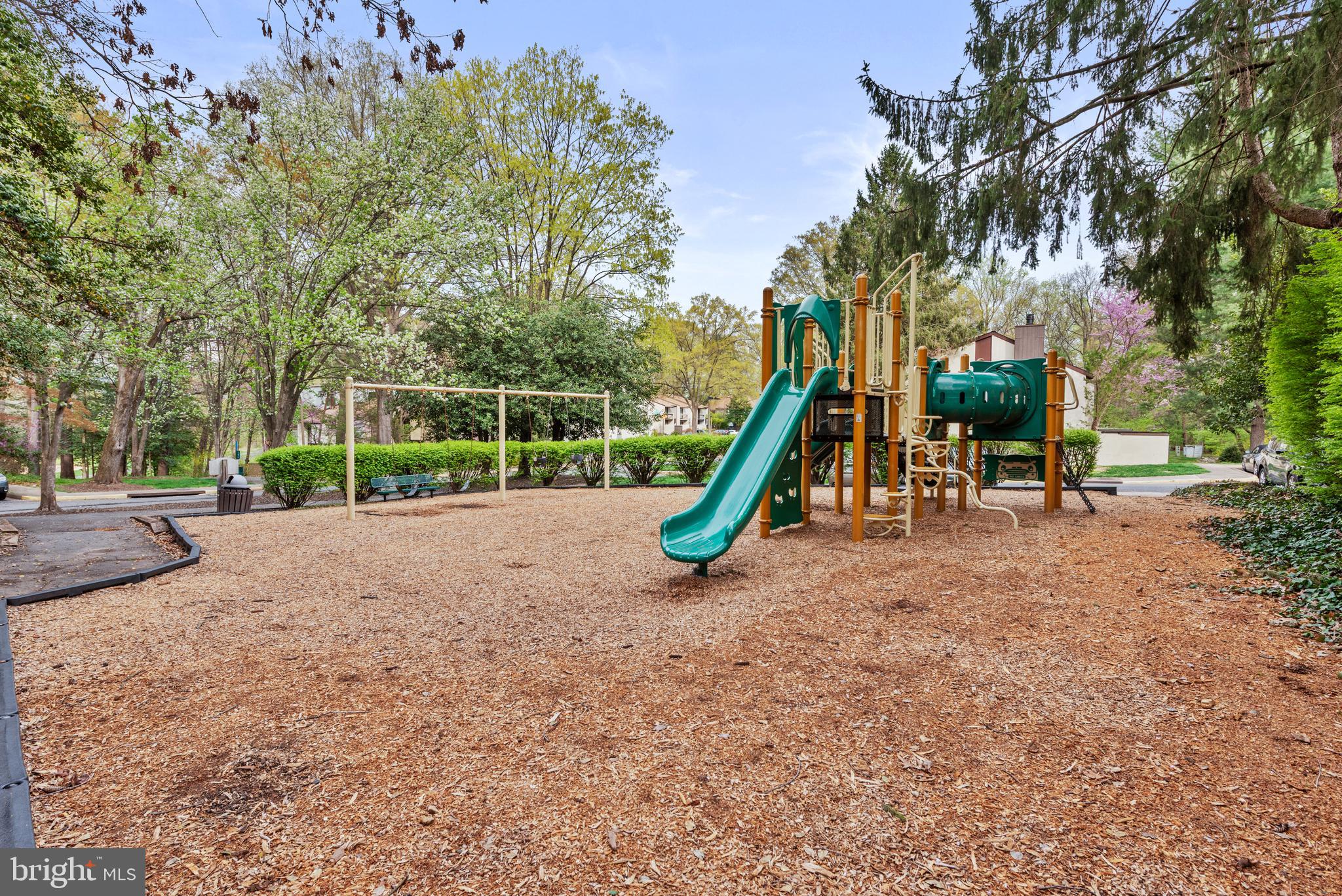 11711 Newbridge Court Reston, VA 20191 - Photo 35 of 37 a view of a park with swings and slides