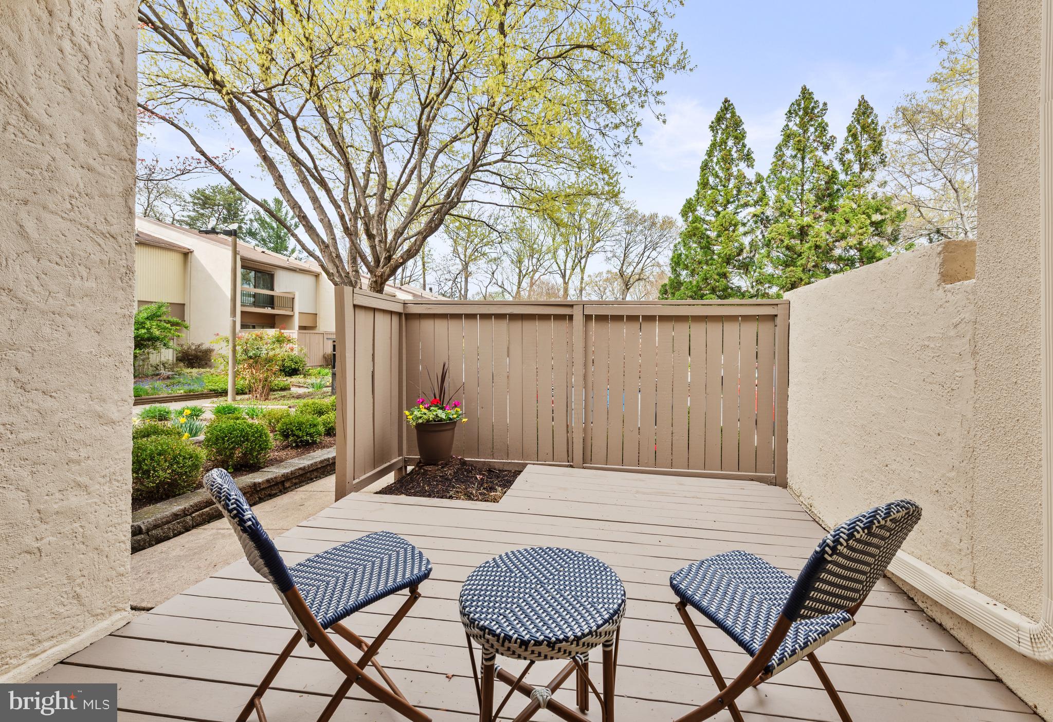 11711 Newbridge Court Reston, VA 20191 - Photo 4 of 37 a view of a patio with a table and chairs