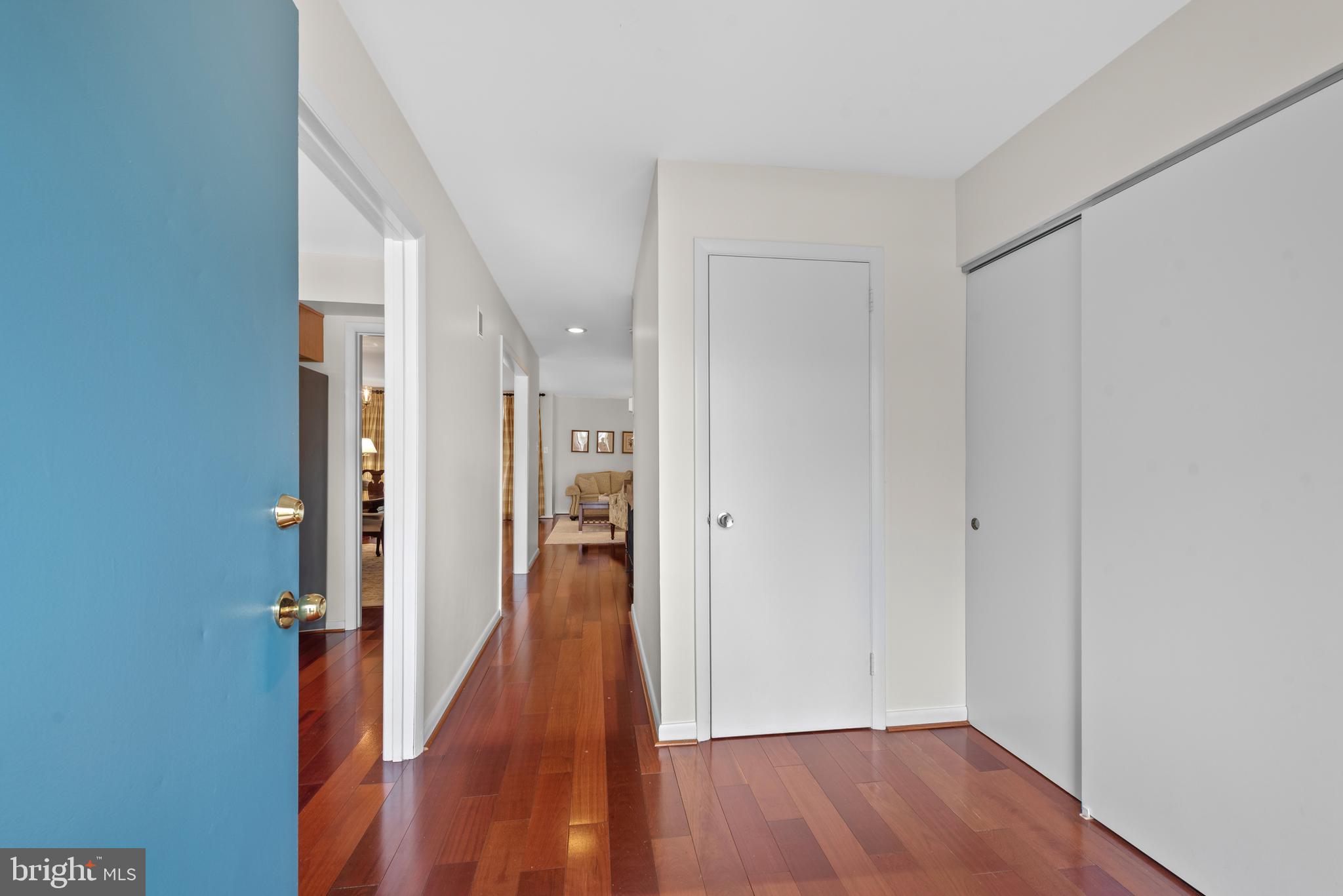 11711 Newbridge Court Reston, VA 20191 - Photo 5 of 37 a view of a hallway with wooden floor
