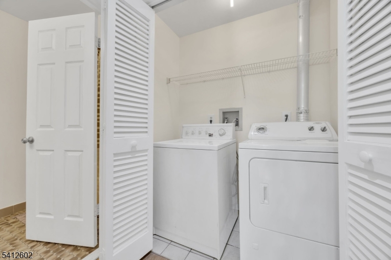 113 Heather Court Edison, NJ 08820 - Photo 24 of 30 a utility room with dryer and washer