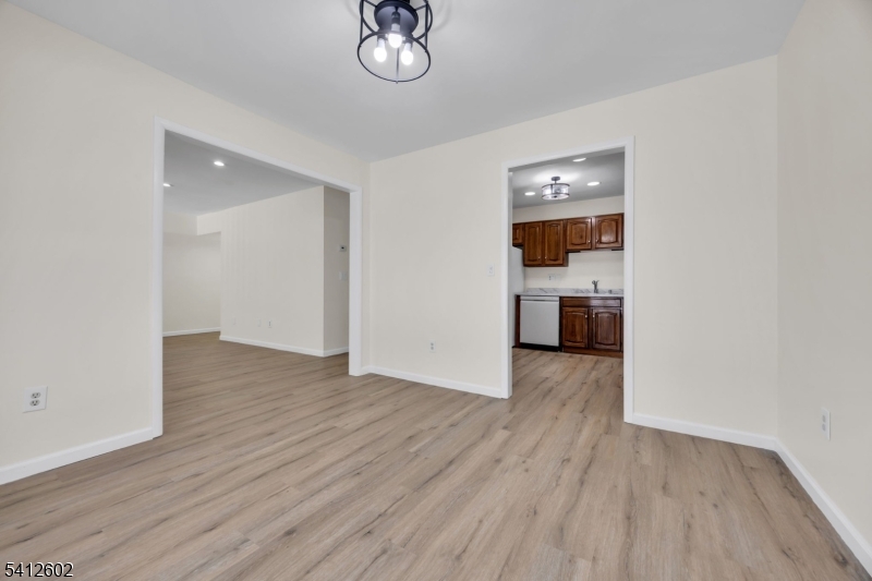 113 Heather Court Edison, NJ 08820 - Photo 9 of 30 wooden floor in an empty room with a window