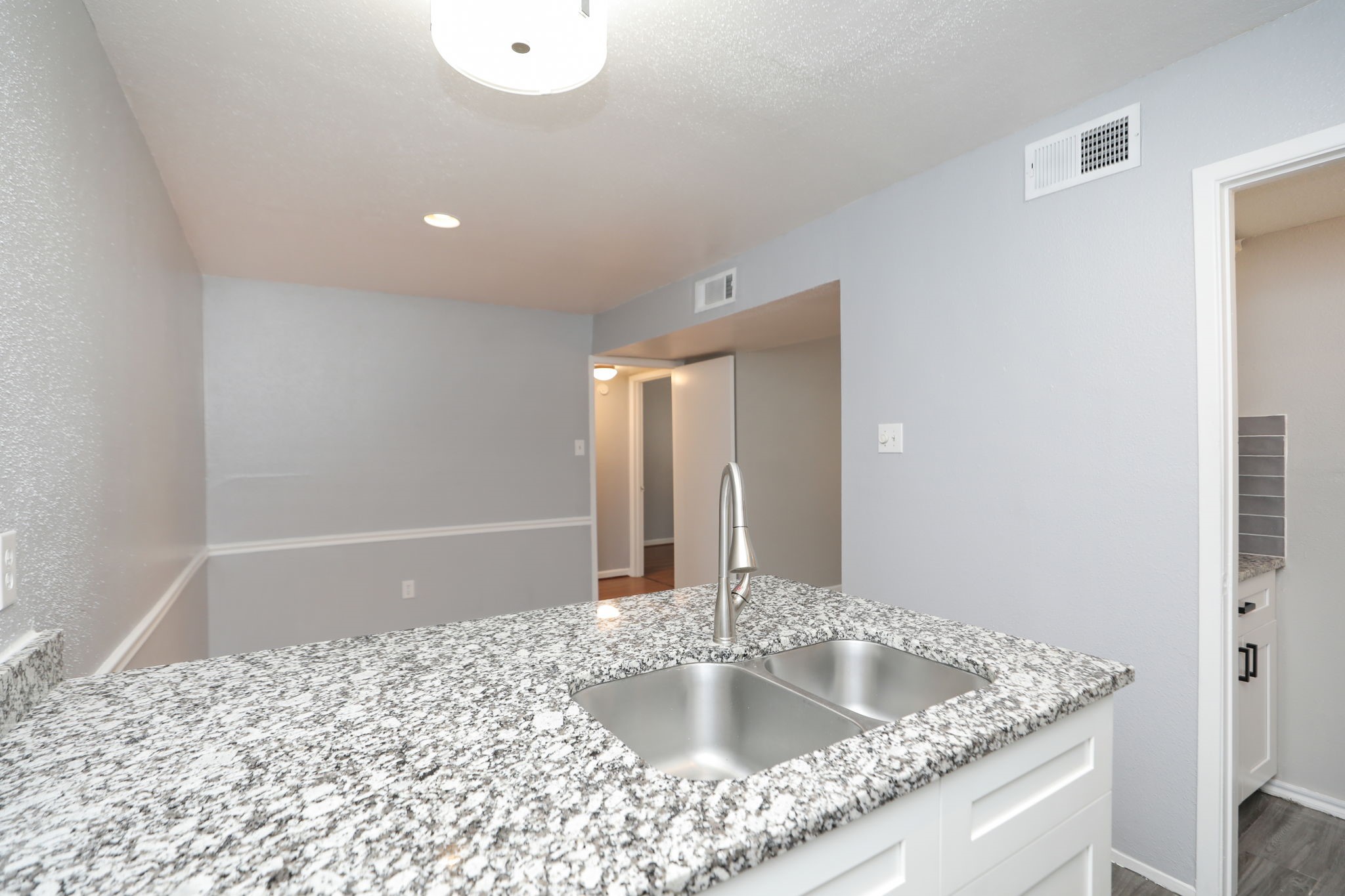 2100 Wilcrest Drive, Unit 127 Houston, TX 77077 - Photo 20 of 38 a bathroom with a granite countertop sink a bathtub and shower