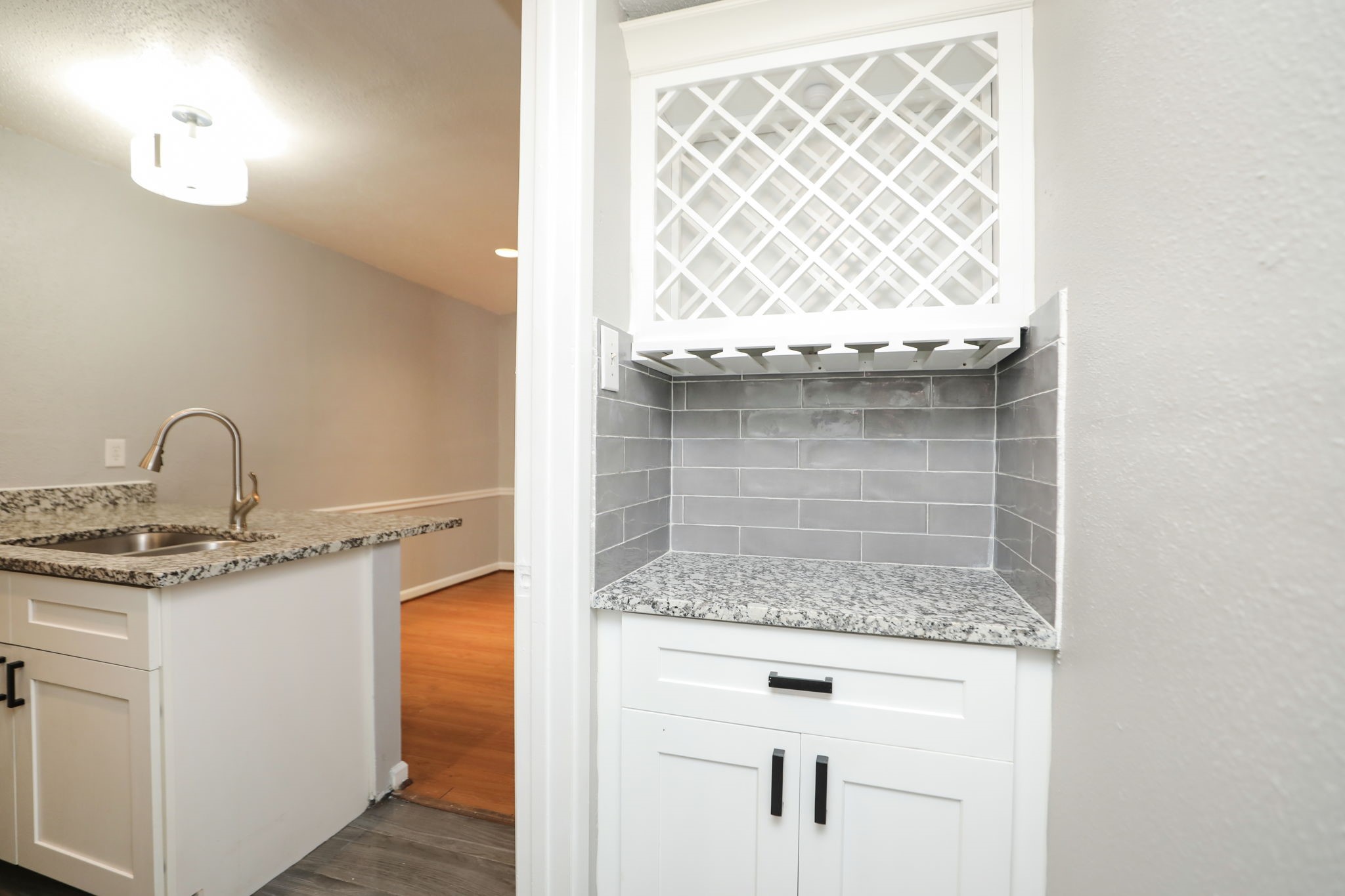 2100 Wilcrest Drive, Unit 127 Houston, TX 77077 - Photo 22 of 38 a bathroom with a granite countertop sink and a mirror