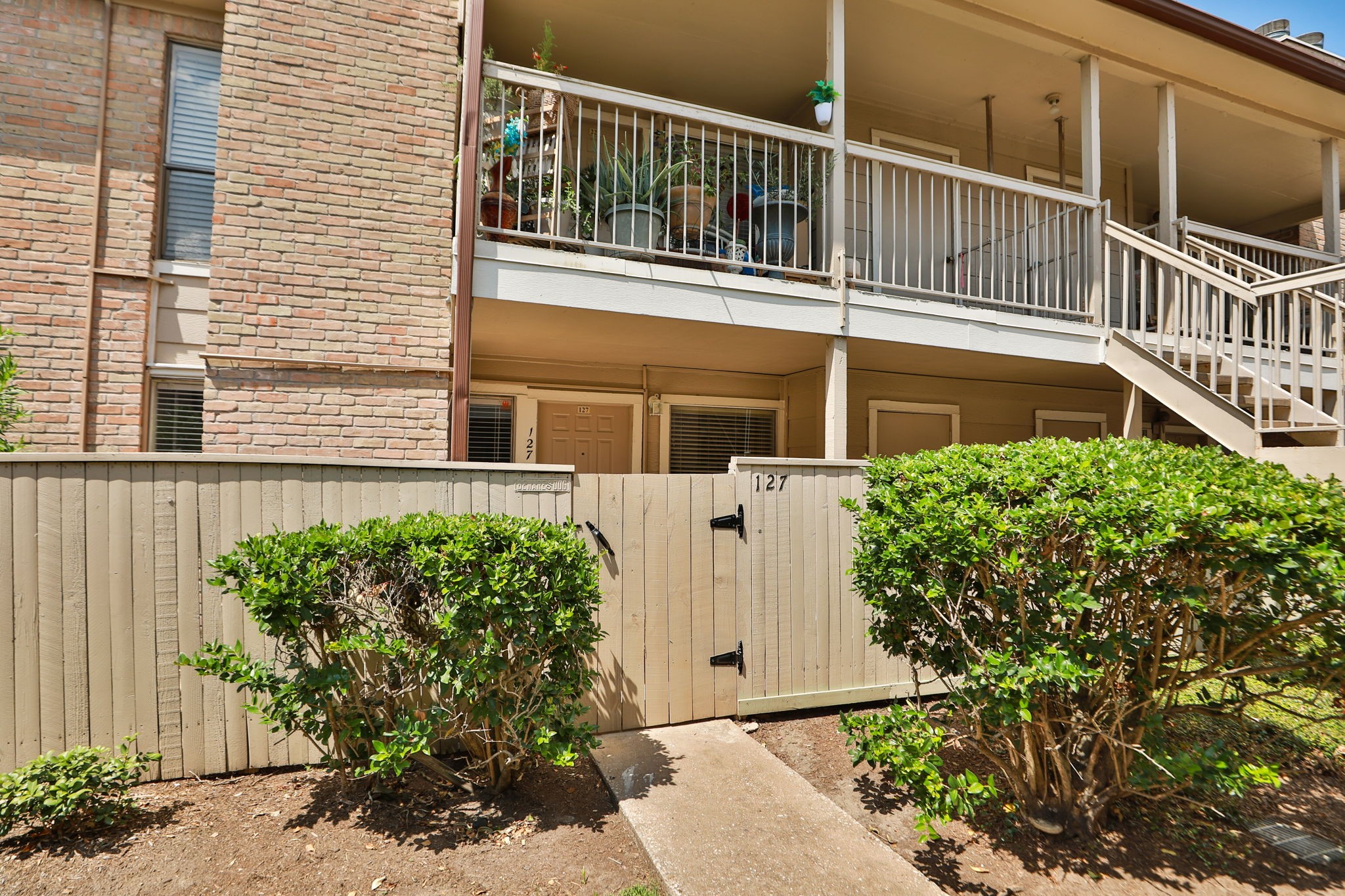 2100 Wilcrest Drive, Unit 127 Houston, TX 77077 - Photo 3 of 38 front view of a house