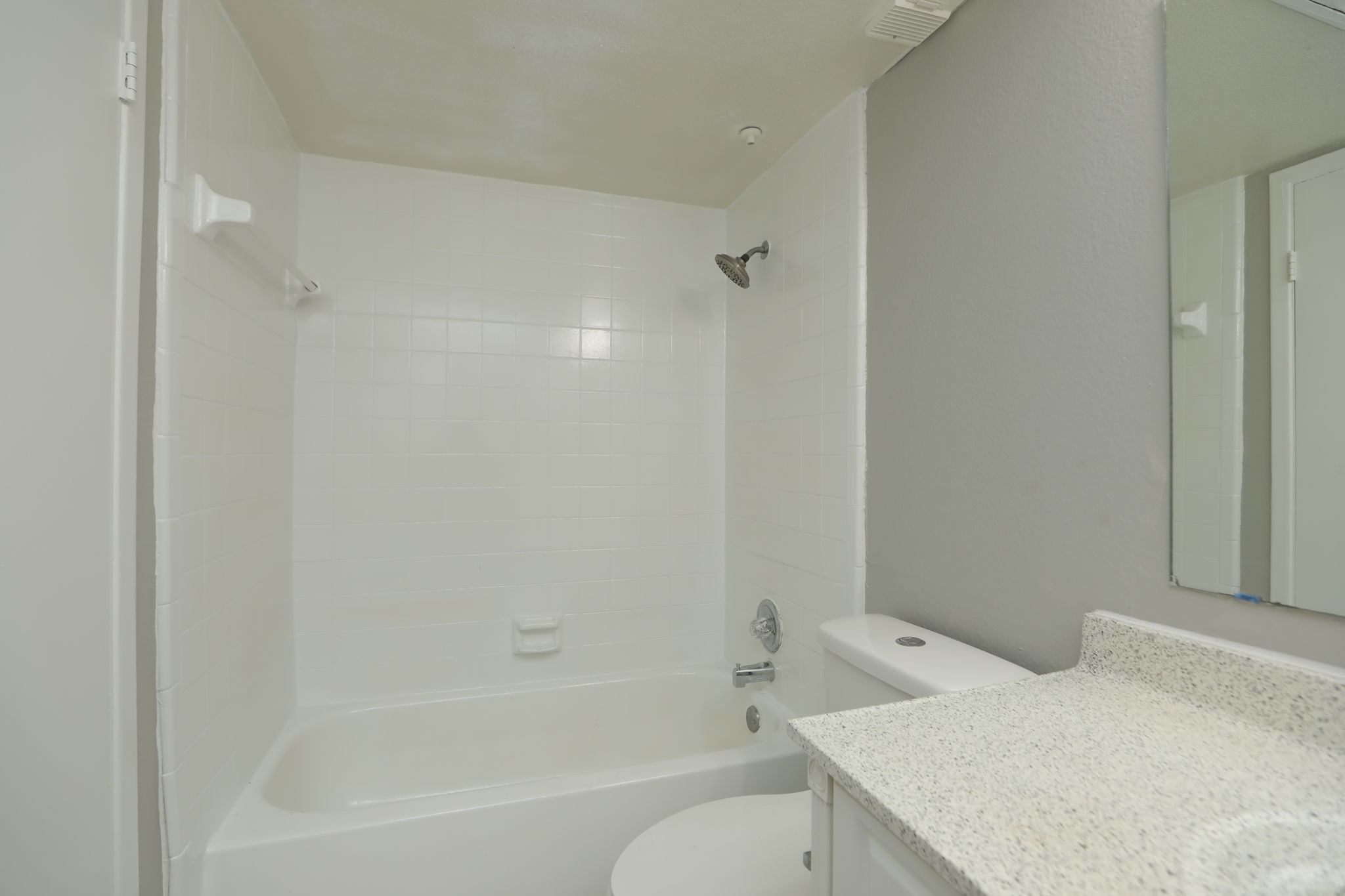 2100 Wilcrest Drive, Unit 127 Houston, TX 77077 - Photo 34 of 38 a bathroom with a bathtub and toilet