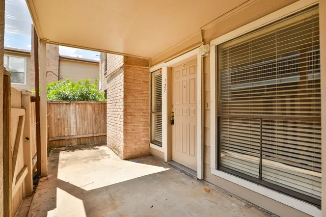 a balcony view with a outdoor space