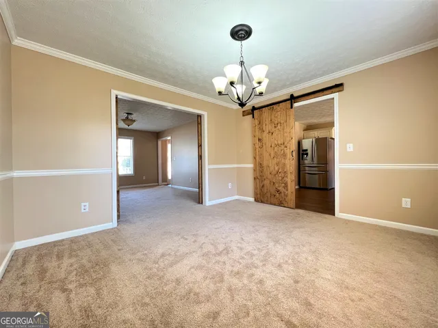 en view interior of a house an entryway and chandelier fan