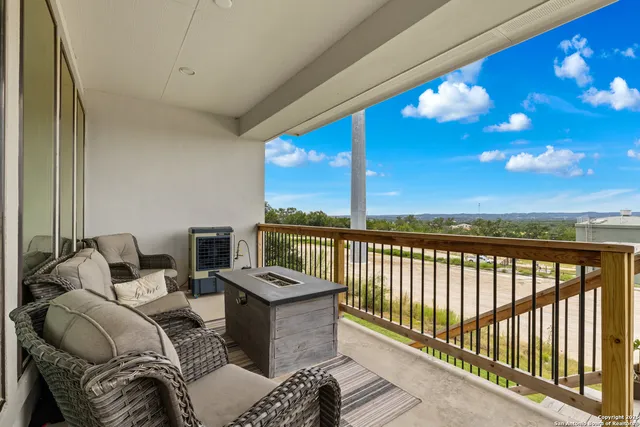 a balcony with furniture