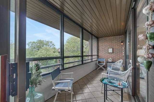 a room with furniture and a large window