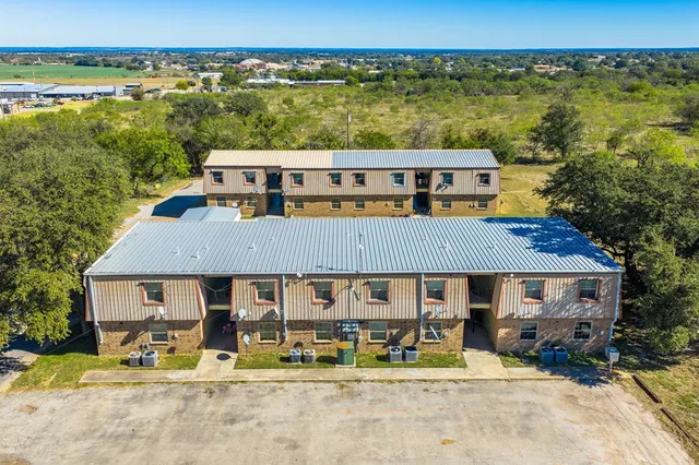 a aerial view of a house with a patio