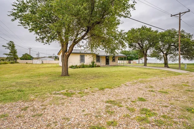 a view of an ocean with a swimming pool